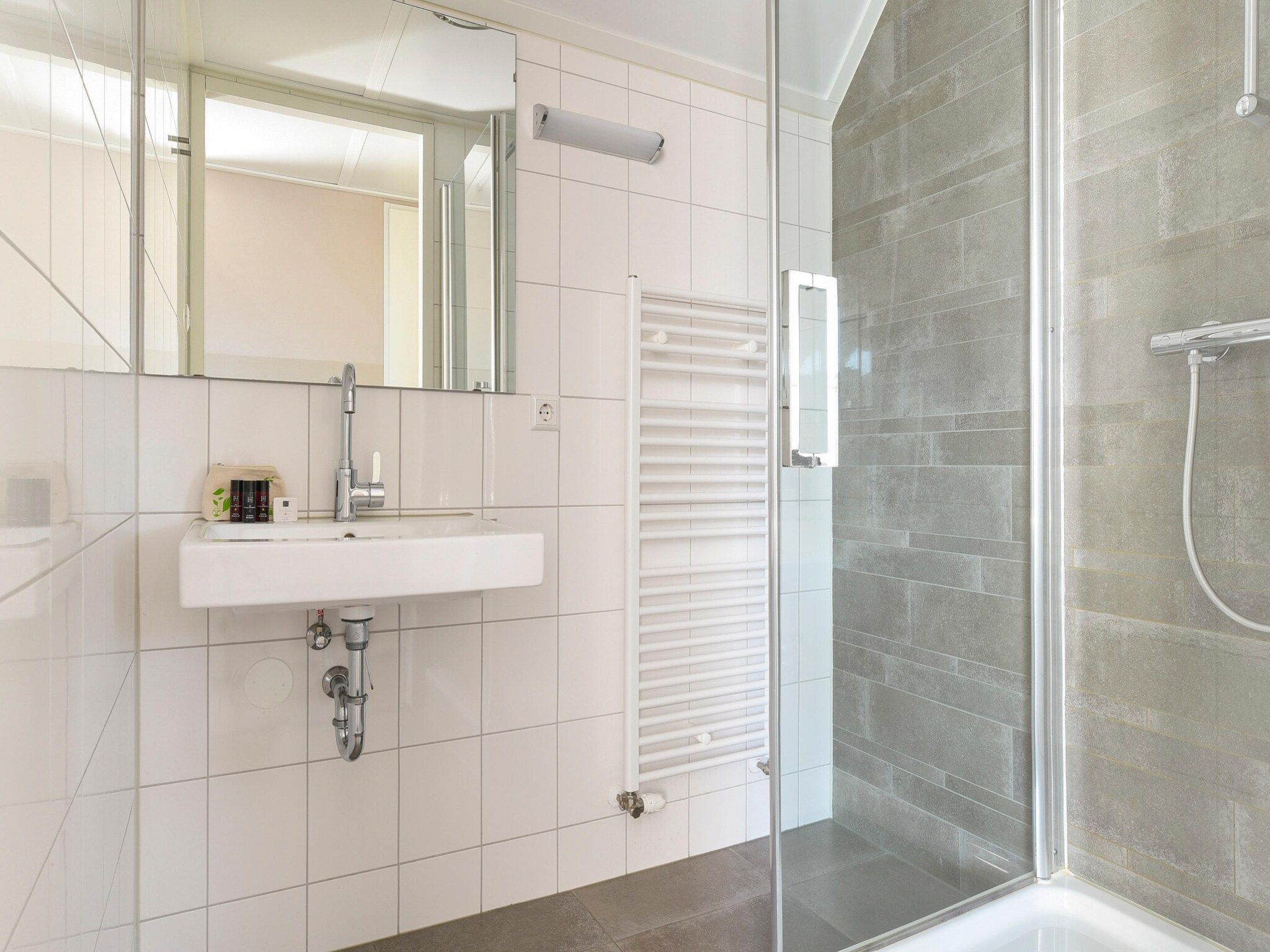 De badkamer van Strand Resort Nieuwvliet-Bad 4 in Nieuwvliet