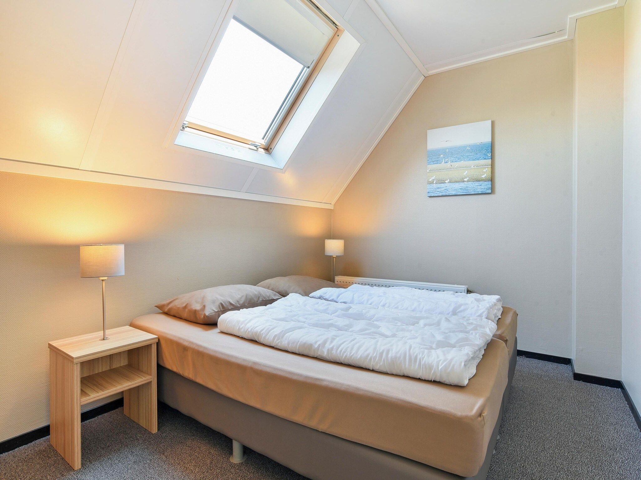 Een slaapkamer van Strand Resort Nieuwvliet-Bad 4 in Nieuwvliet