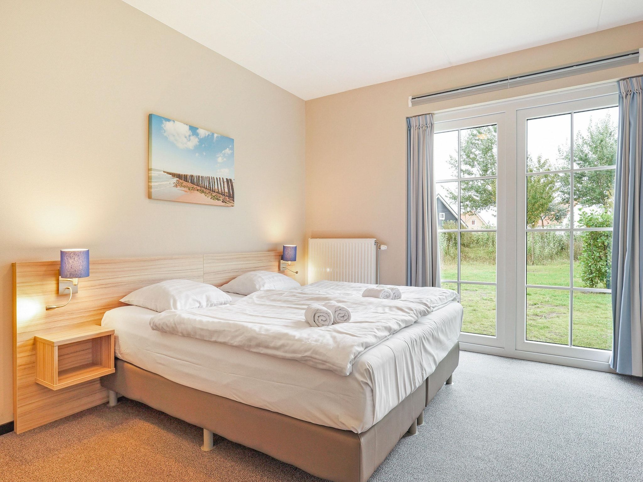 Een slaapkamer van Strand Resort Nieuwvliet-Bad 4 in Nieuwvliet