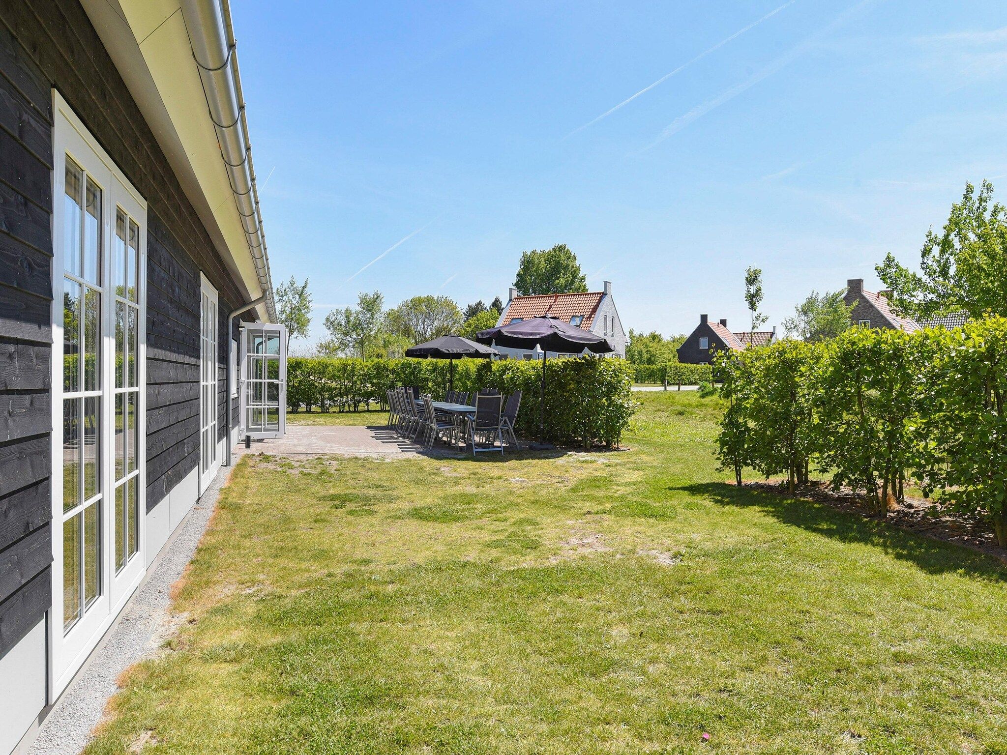 De tuin van Strand Resort Nieuwvliet-Bad 4 in Nieuwvliet