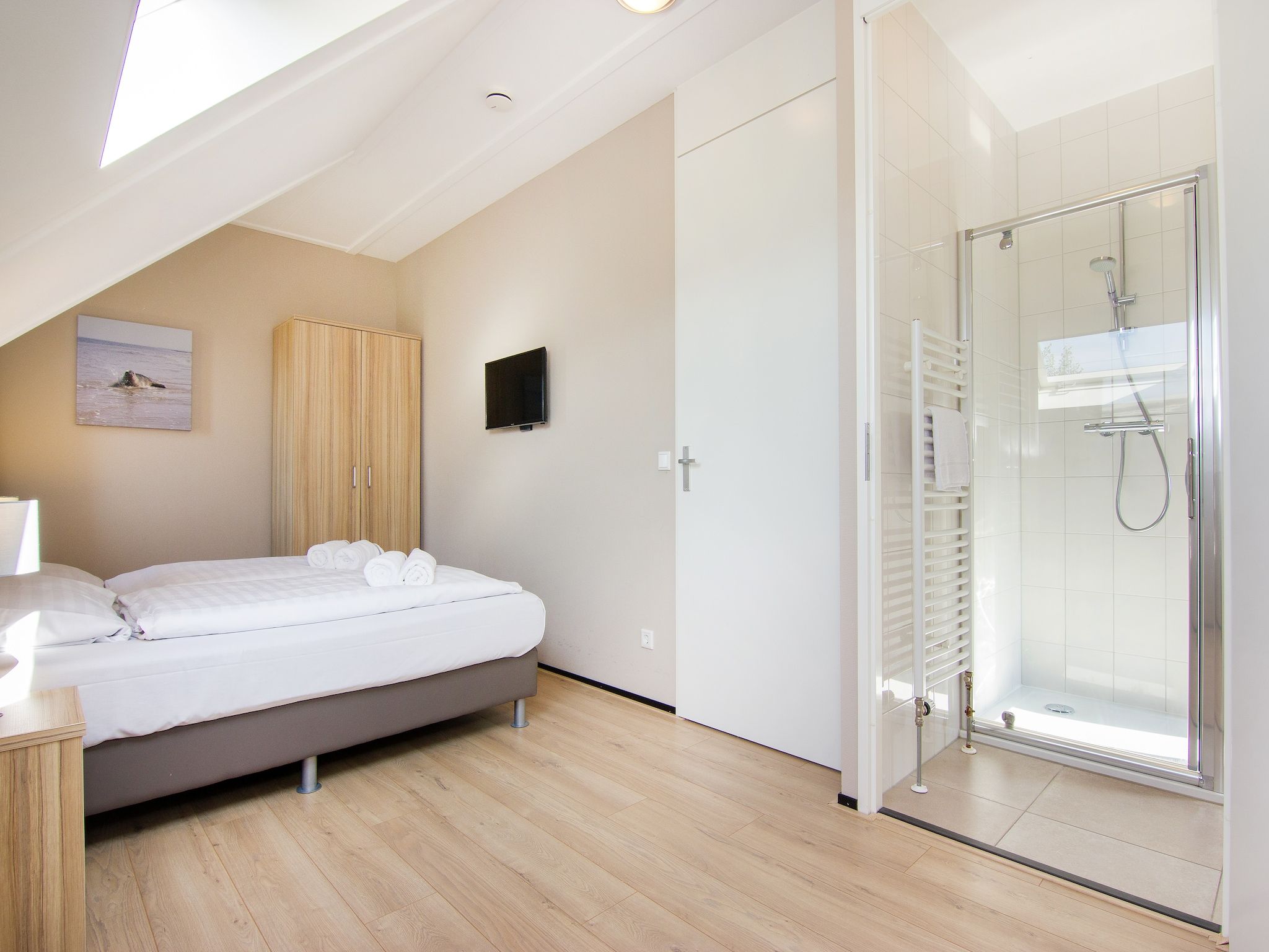 Een slaapkamer van Strand Resort Nieuwvliet-Bad 5 in Nieuwvliet