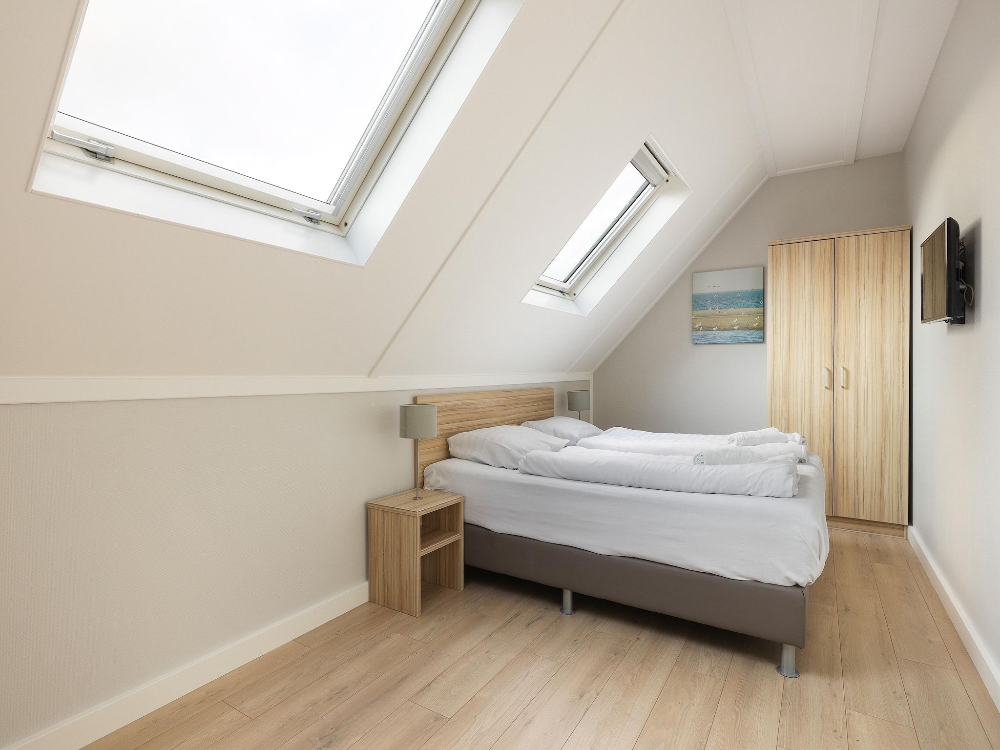 Een slaapkamer van Strand Resort Nieuwvliet-Bad 5 in Nieuwvliet