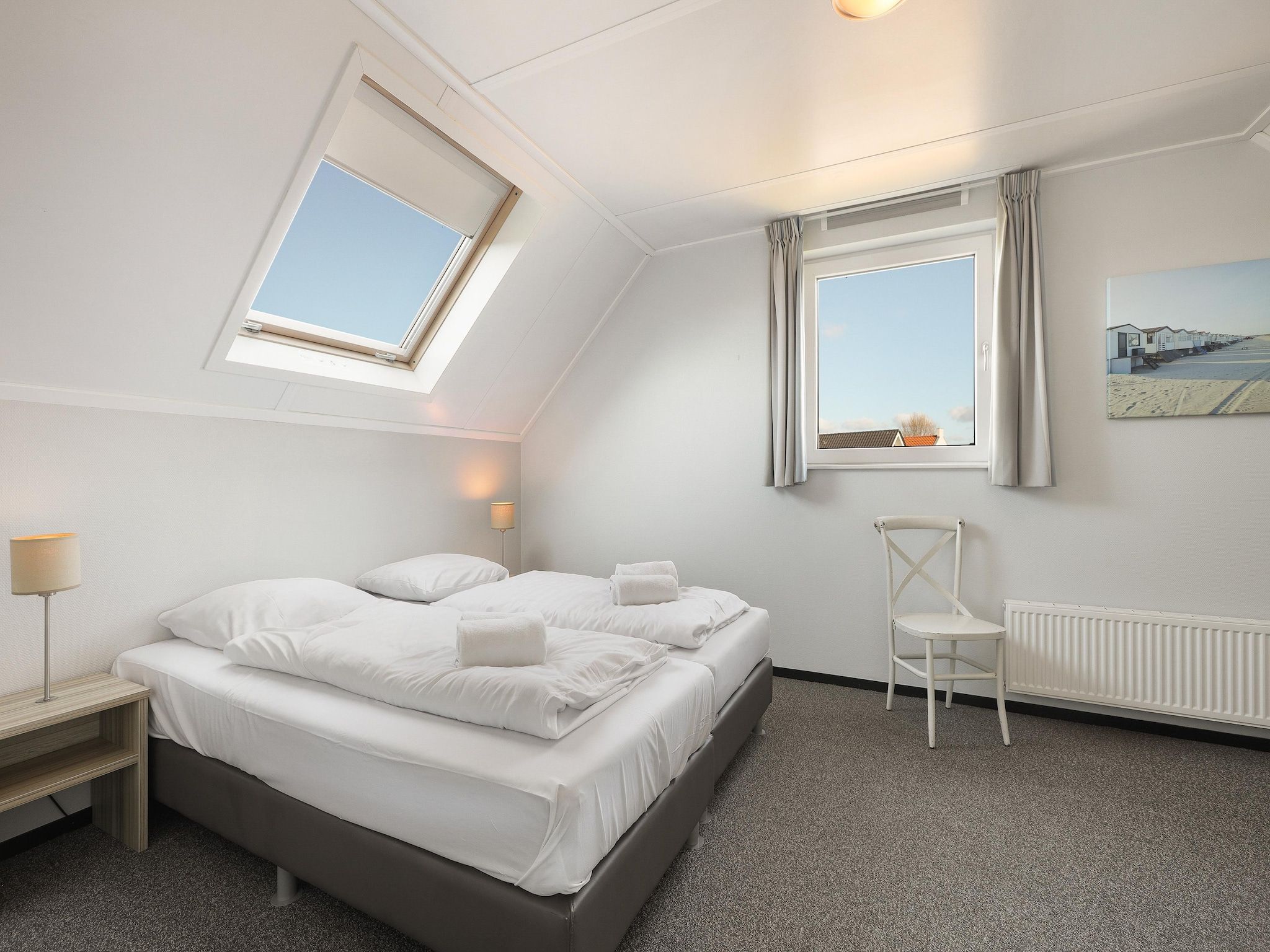 Een slaapkamer van Strand Resort Nieuwvliet-Bad 8 in Nieuwvliet