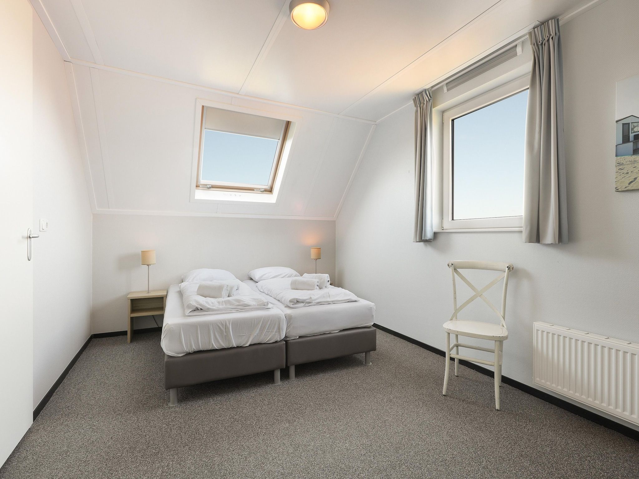 Een slaapkamer van Strand Resort Nieuwvliet-Bad 8 in Nieuwvliet