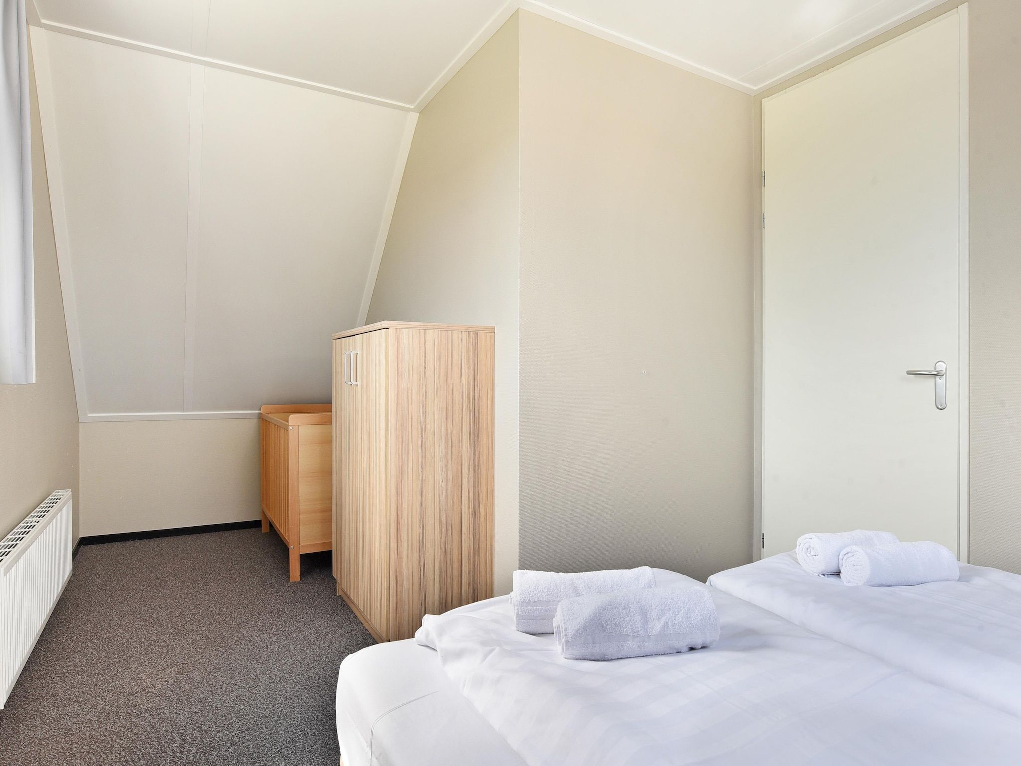 Een slaapkamer van Strand Resort Nieuwvliet-Bad 10 in Nieuwvliet