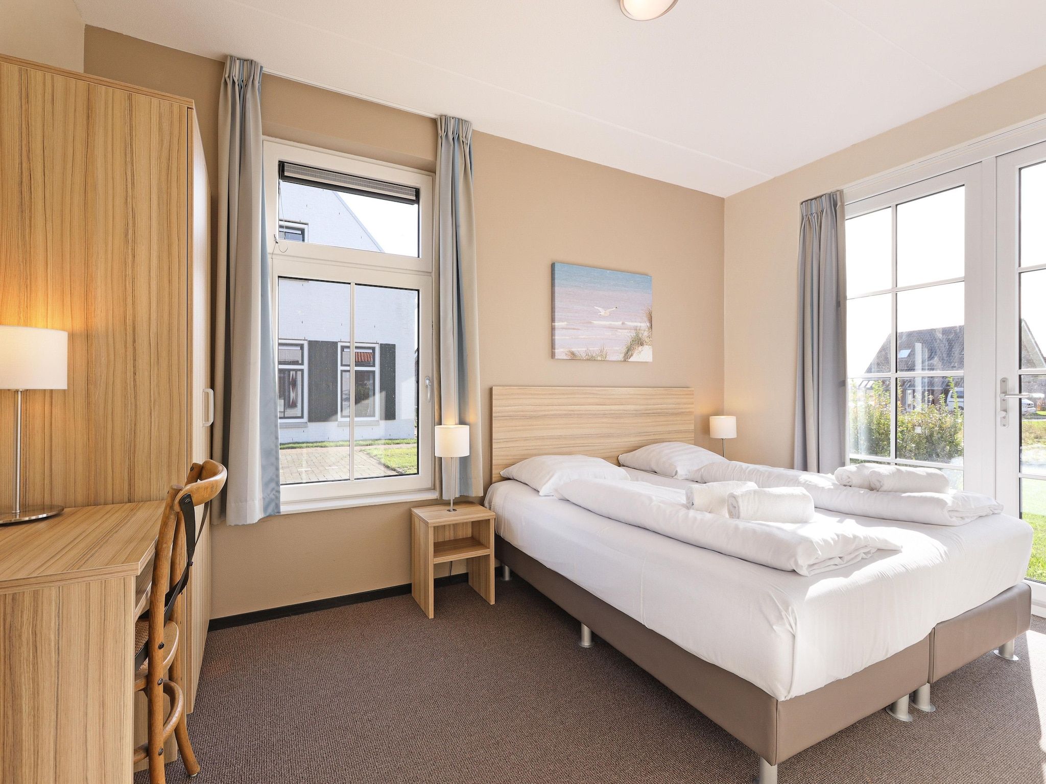 Een slaapkamer van Strand Resort Nieuwvliet-Bad 11 in Nieuwvliet