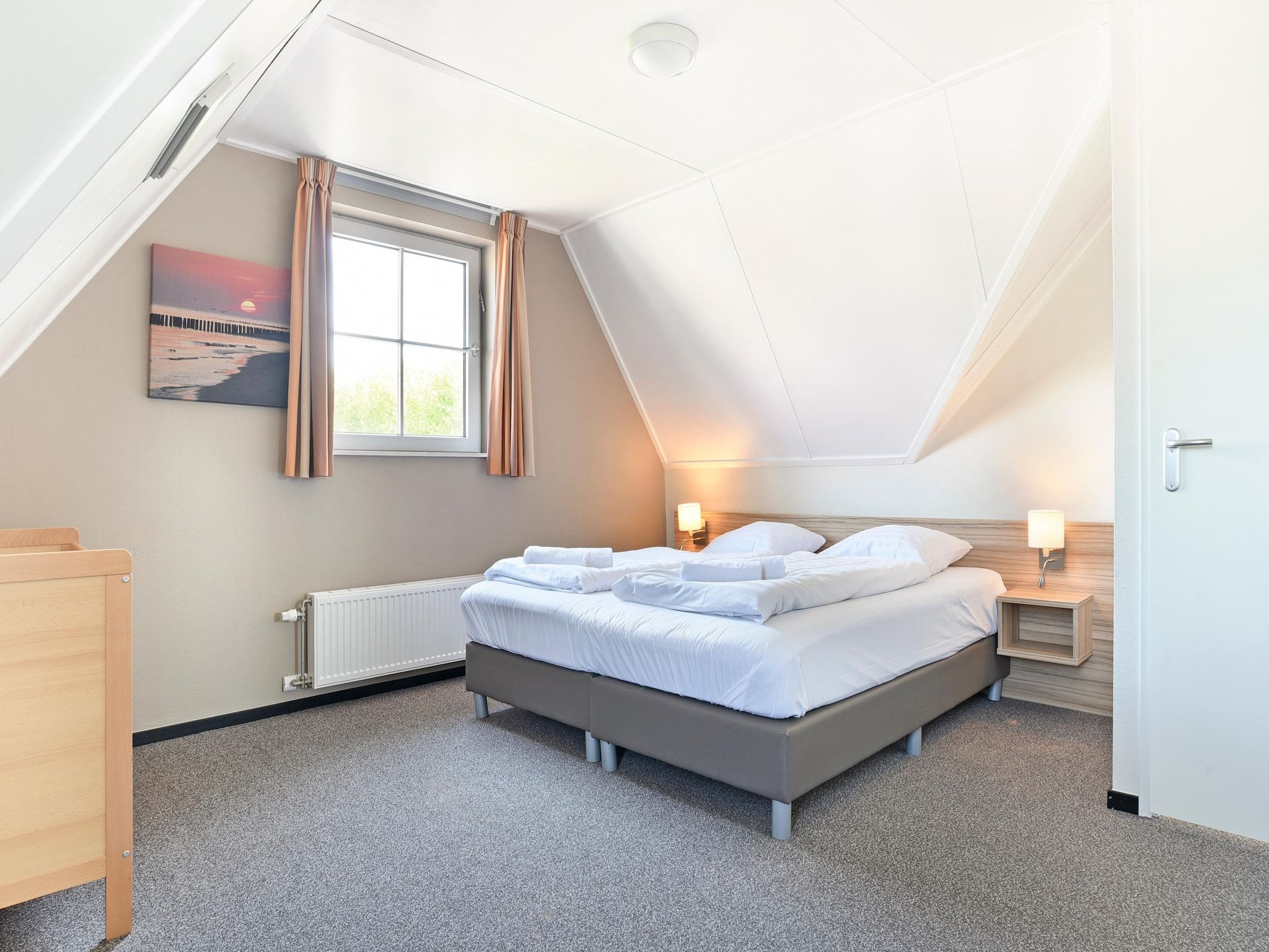 Een slaapkamer van Strand Resort Nieuwvliet-Bad 12 in Nieuwvliet