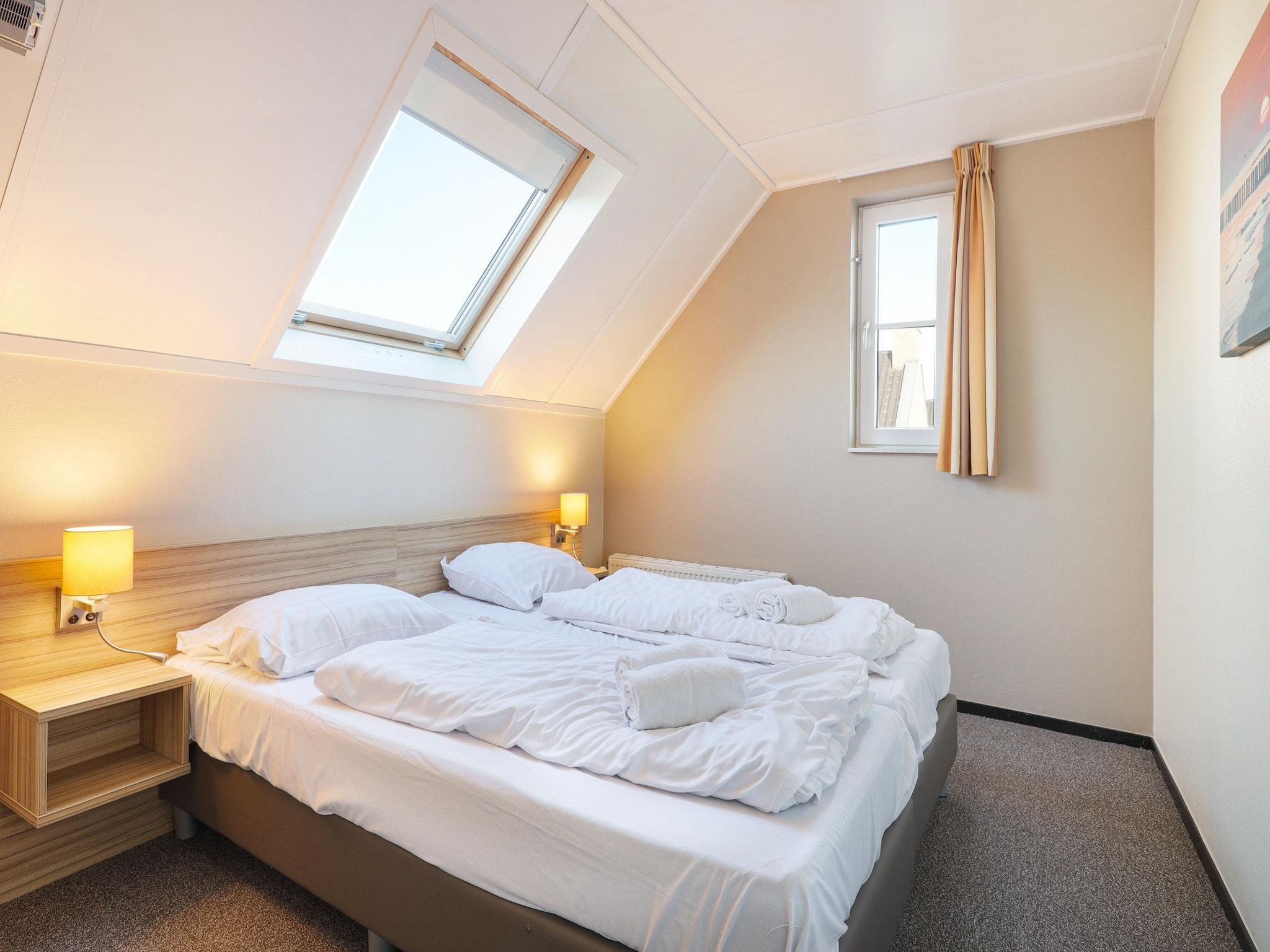 Een slaapkamer van Strand Resort Nieuwvliet-Bad 12 in Nieuwvliet