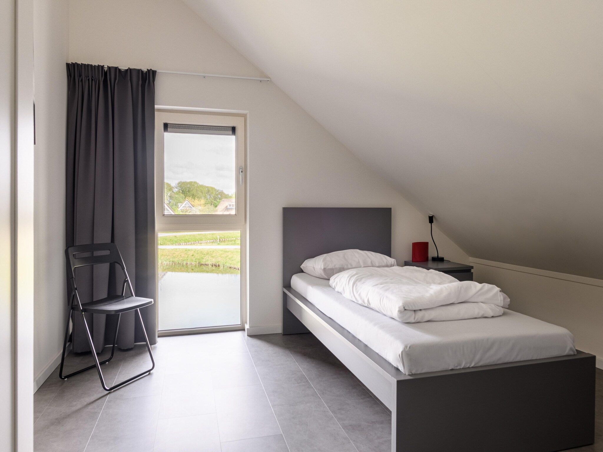 Een slaapkamer van Villapark Akenveen 7 in Tynaarlo