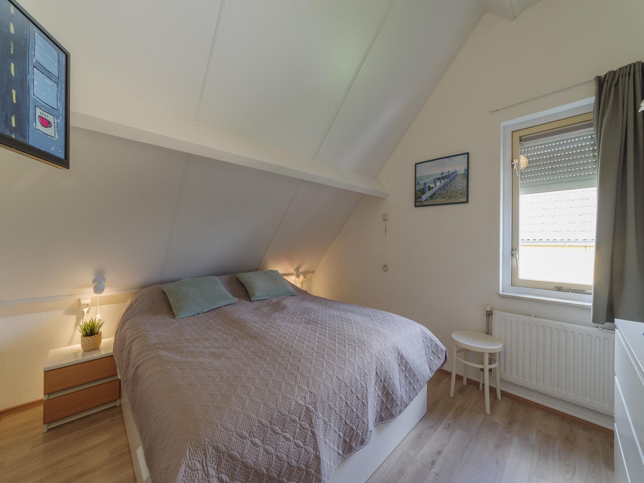 Een slaapkamer van Villapark De Oesterbaai 10 in Wemeldinge