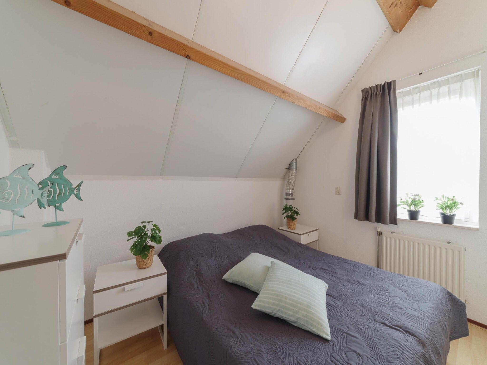 Een slaapkamer van Villapark De Oesterbaai 17 in Wemeldinge