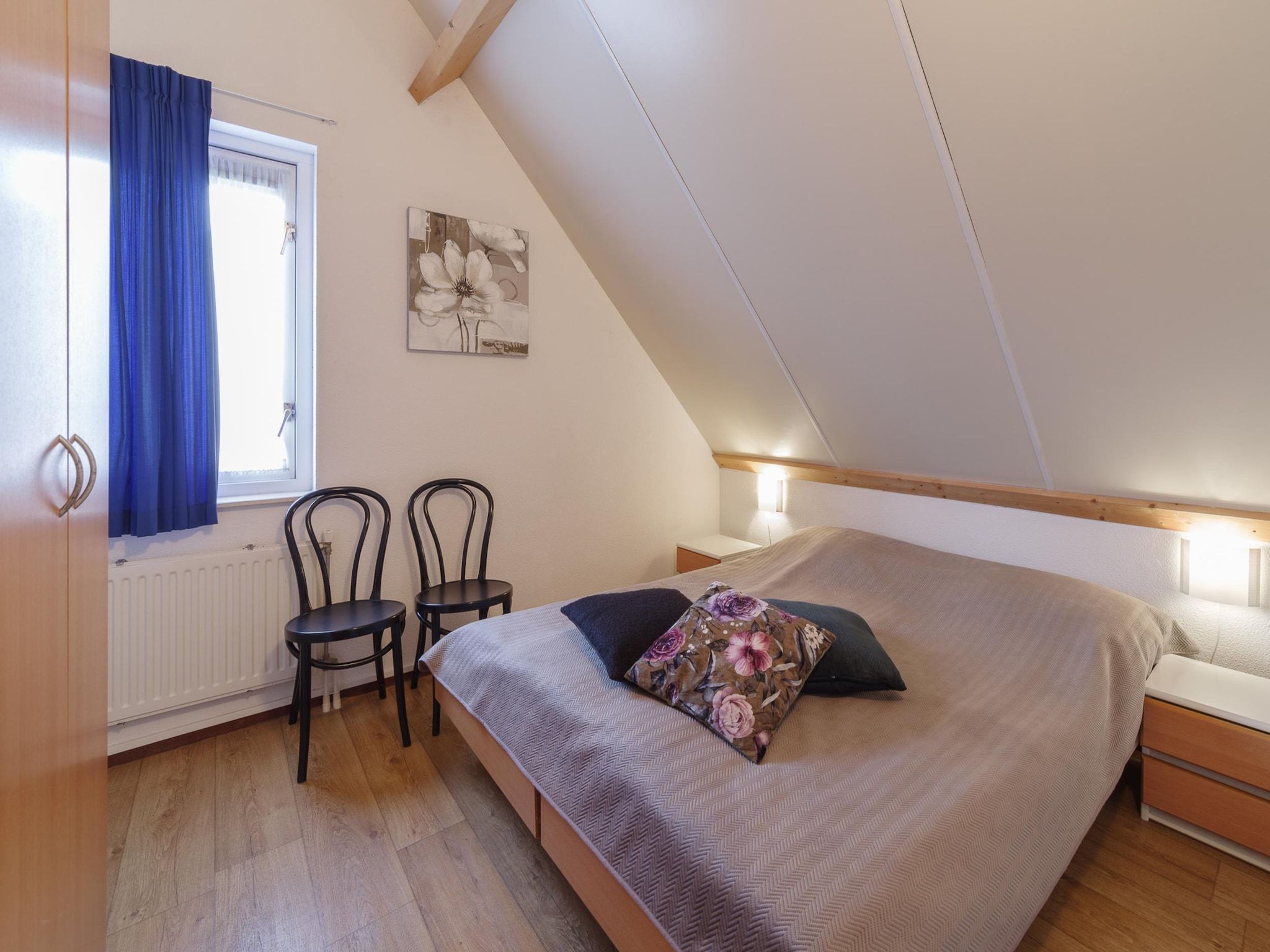 Een slaapkamer van Villapark De Oesterbaai 23 in Wemeldinge