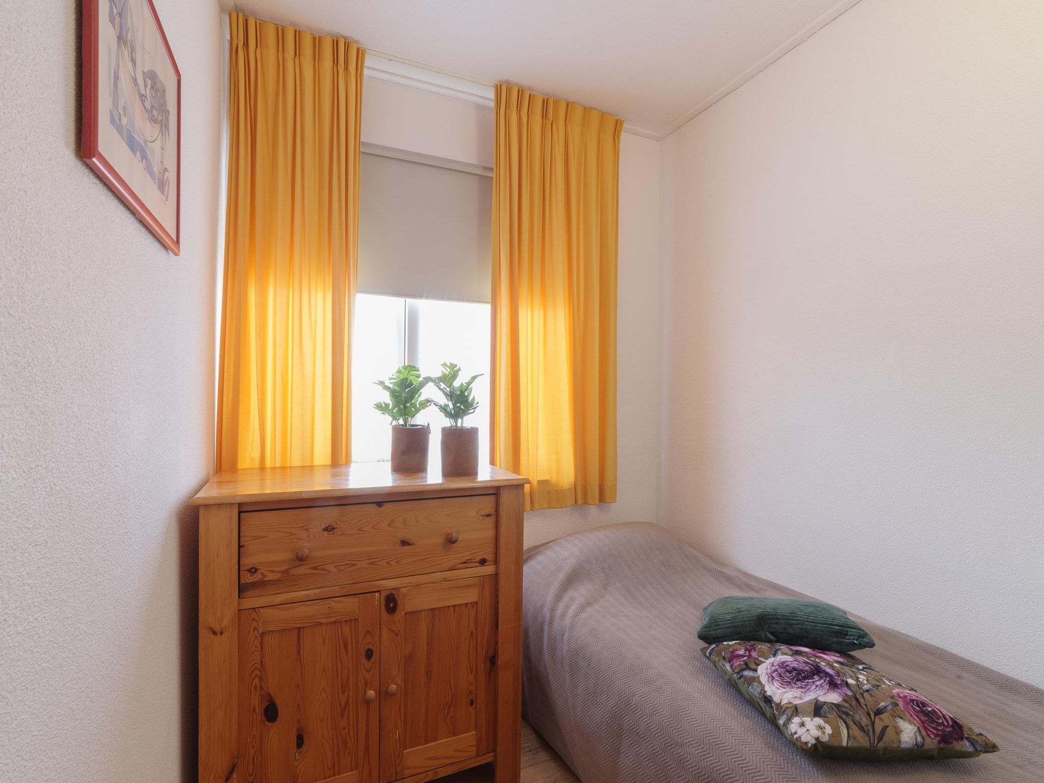 Een slaapkamer van Villapark De Oesterbaai 23 in Wemeldinge