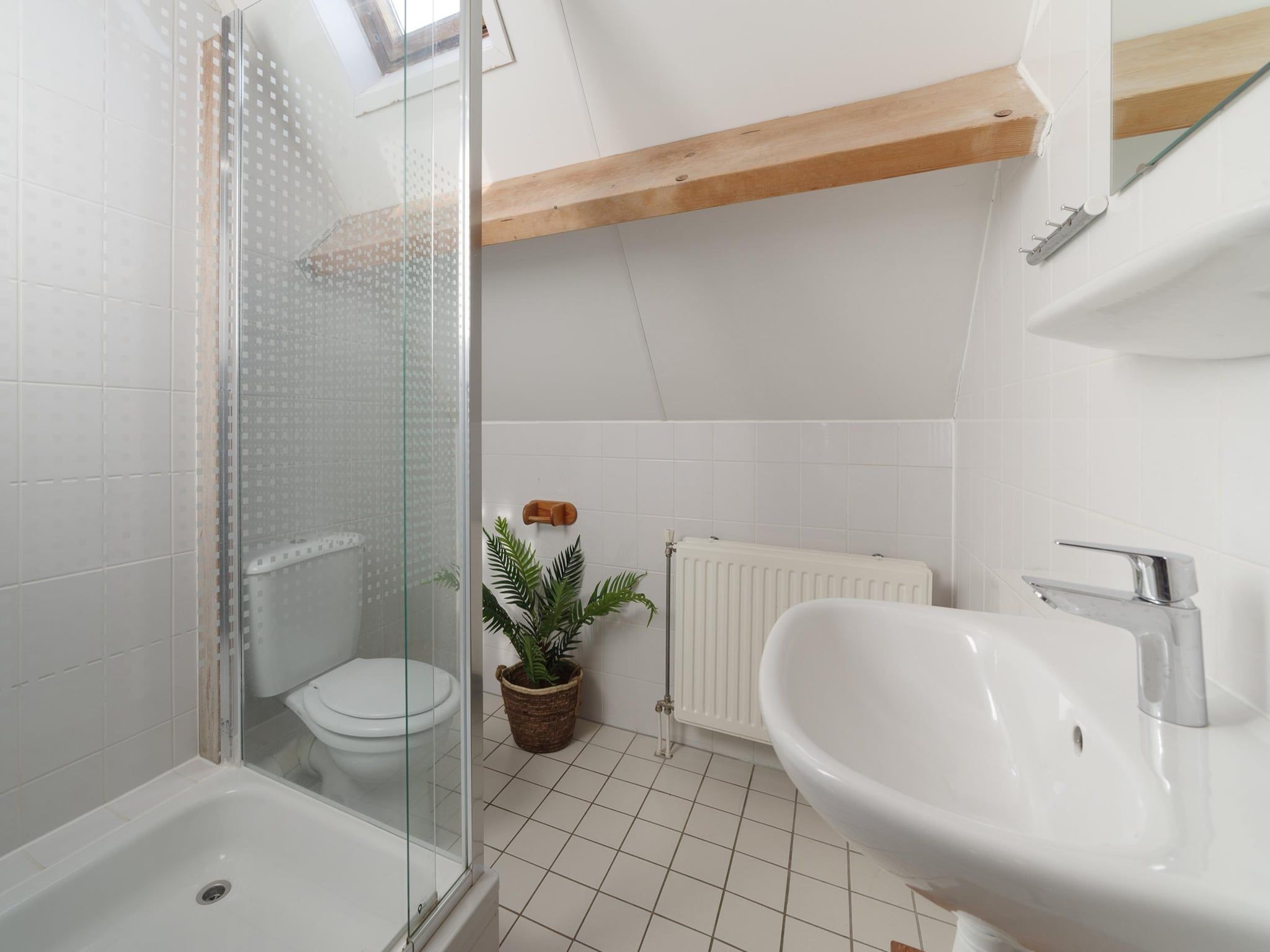 De badkamer van Villapark De Oesterbaai 23 in Wemeldinge