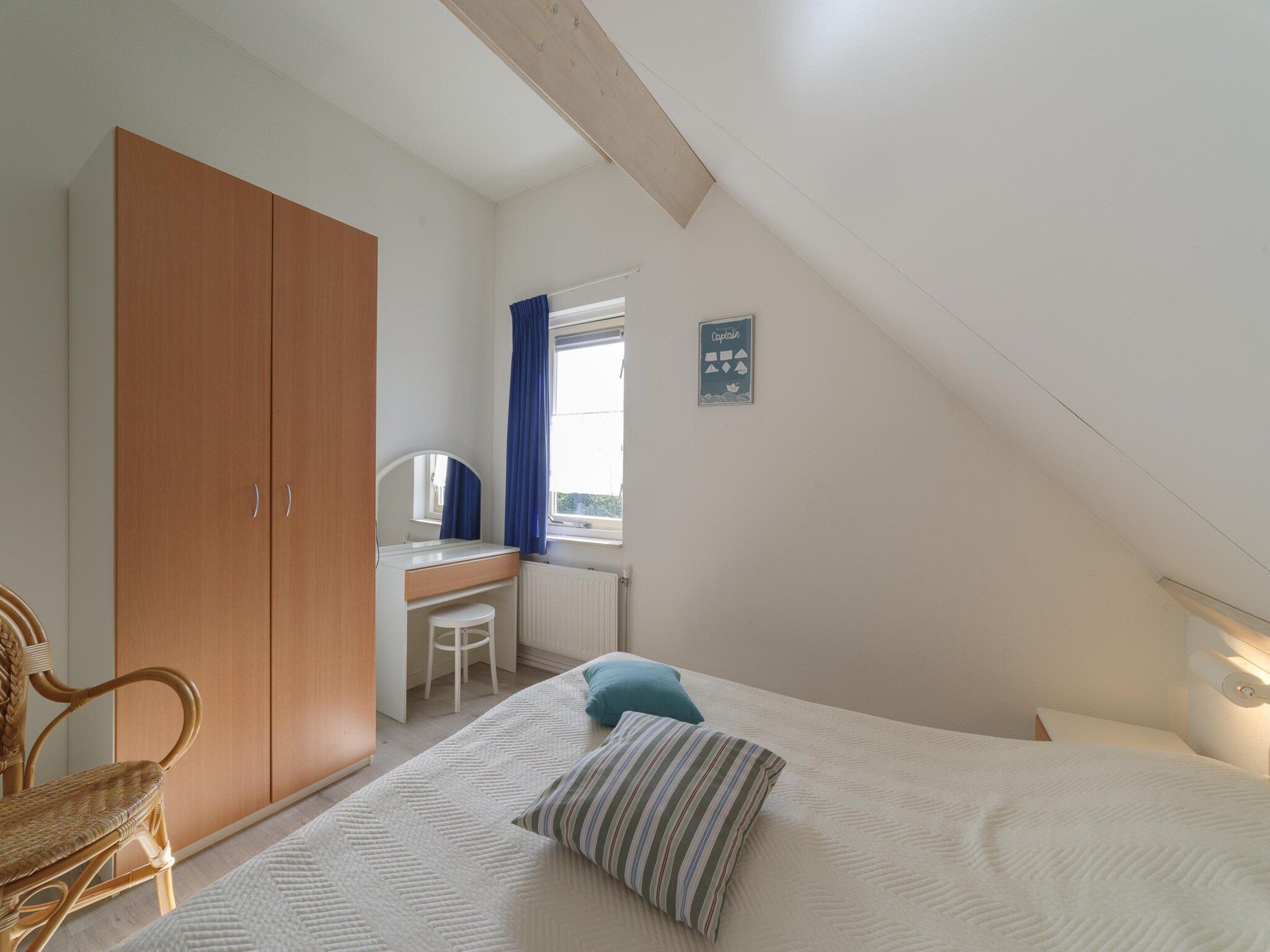 Een slaapkamer van Villapark De Oesterbaai 28 in Wemeldinge