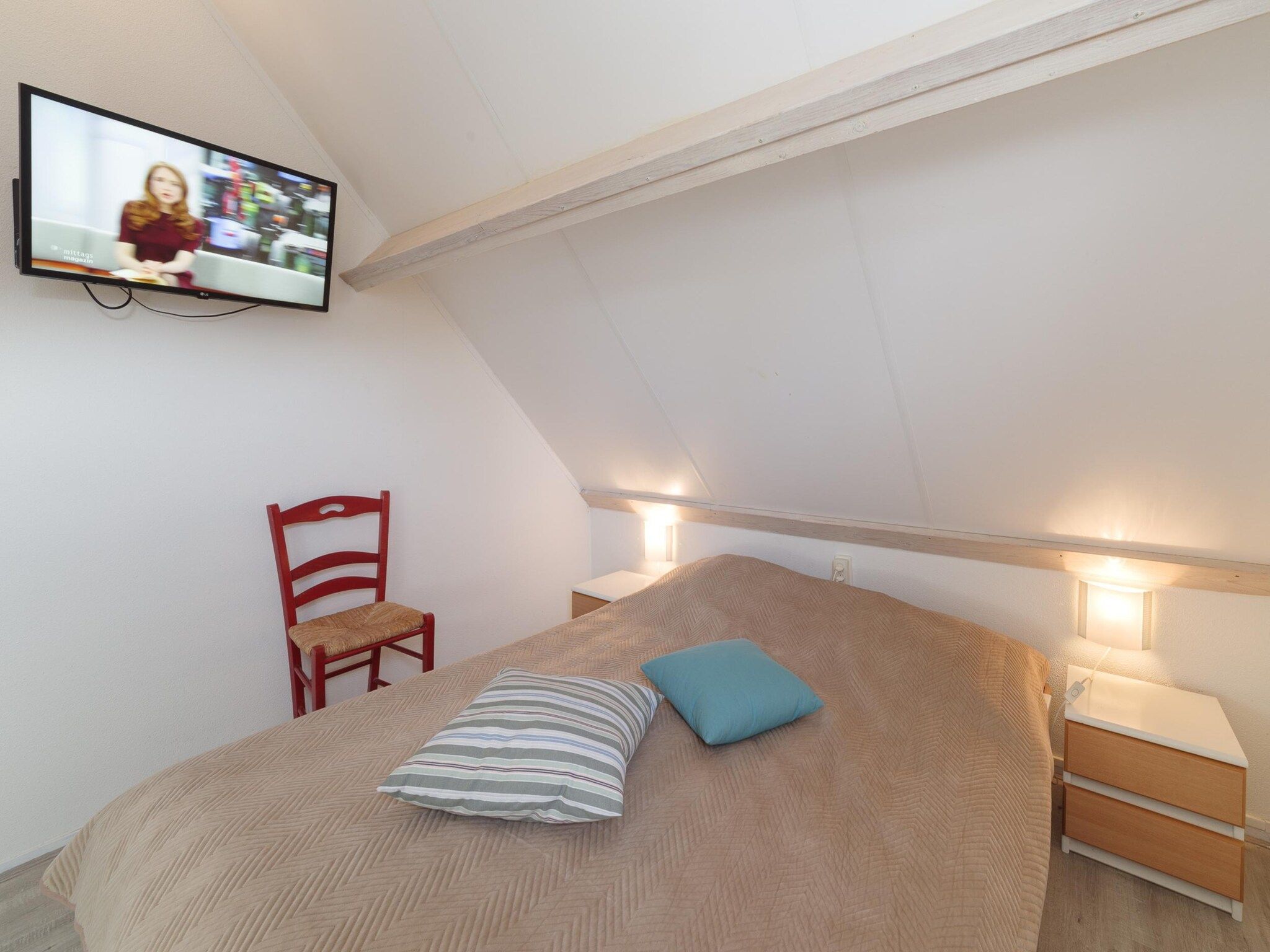 Een slaapkamer van Villapark De Oesterbaai 28 in Wemeldinge