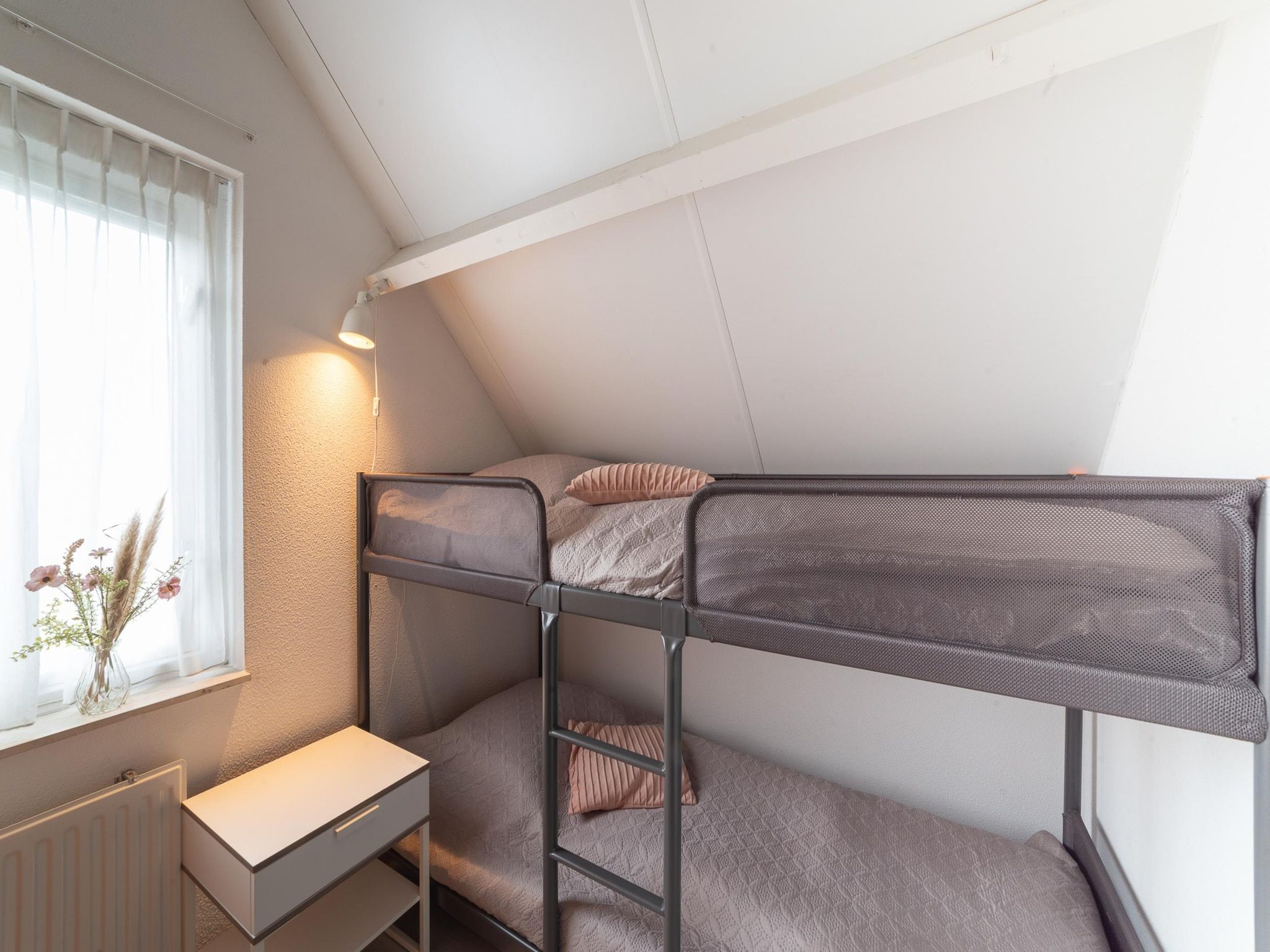 Een slaapkamer van Villapark De Oesterbaai 31 in Wemeldinge