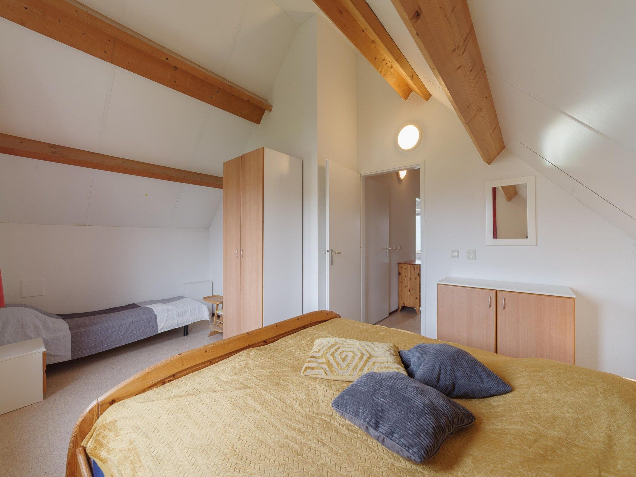 Een slaapkamer van Villapark De Oesterbaai 54 in Wemeldinge