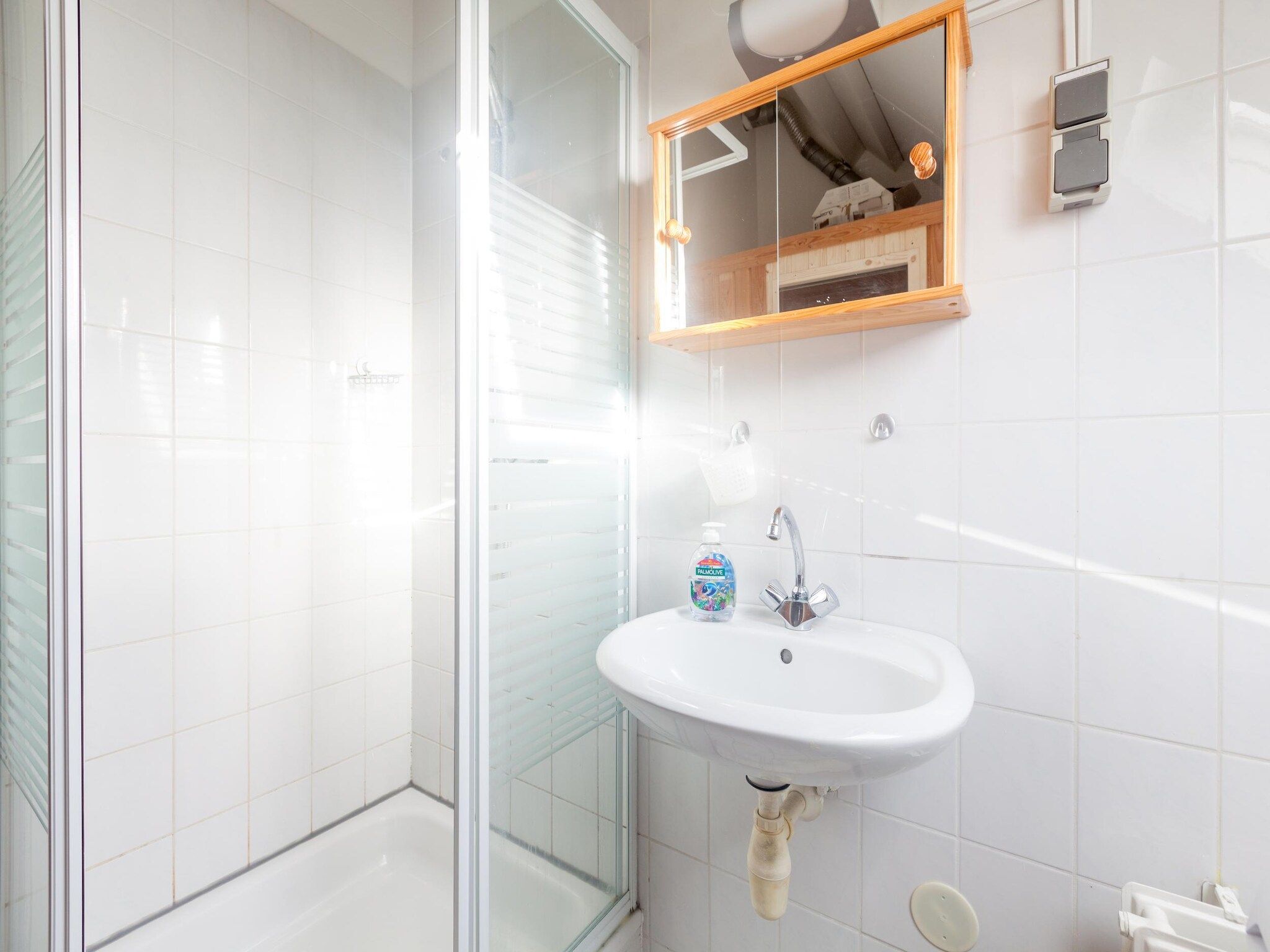 De badkamer van Villapark De Oesterbaai 64 in Wemeldinge