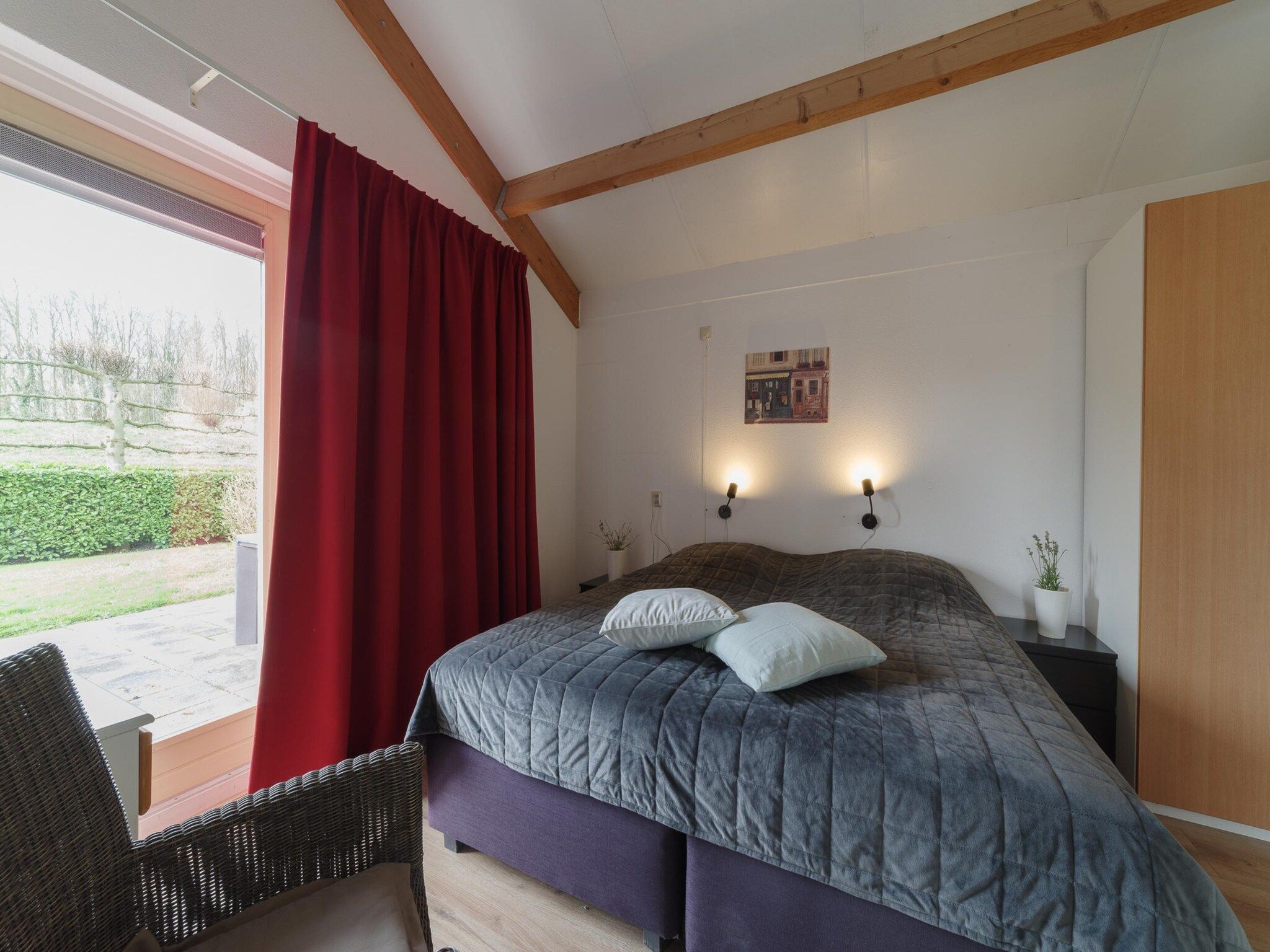 Een slaapkamer van Villapark De Oesterbaai 70 in Wemeldinge