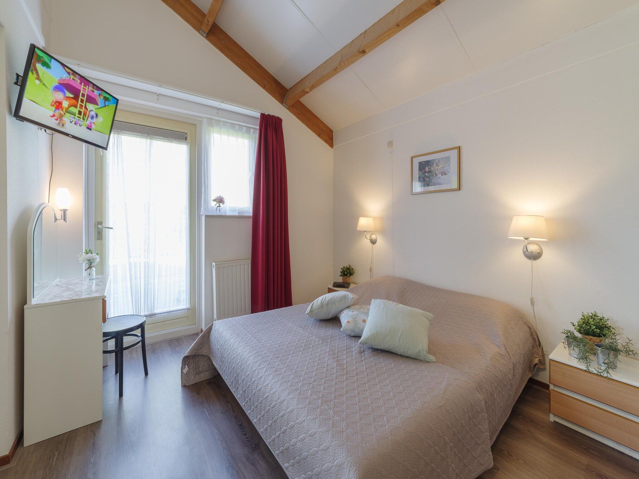 Een slaapkamer van Villapark De Oesterbaai 75 in Wemeldinge