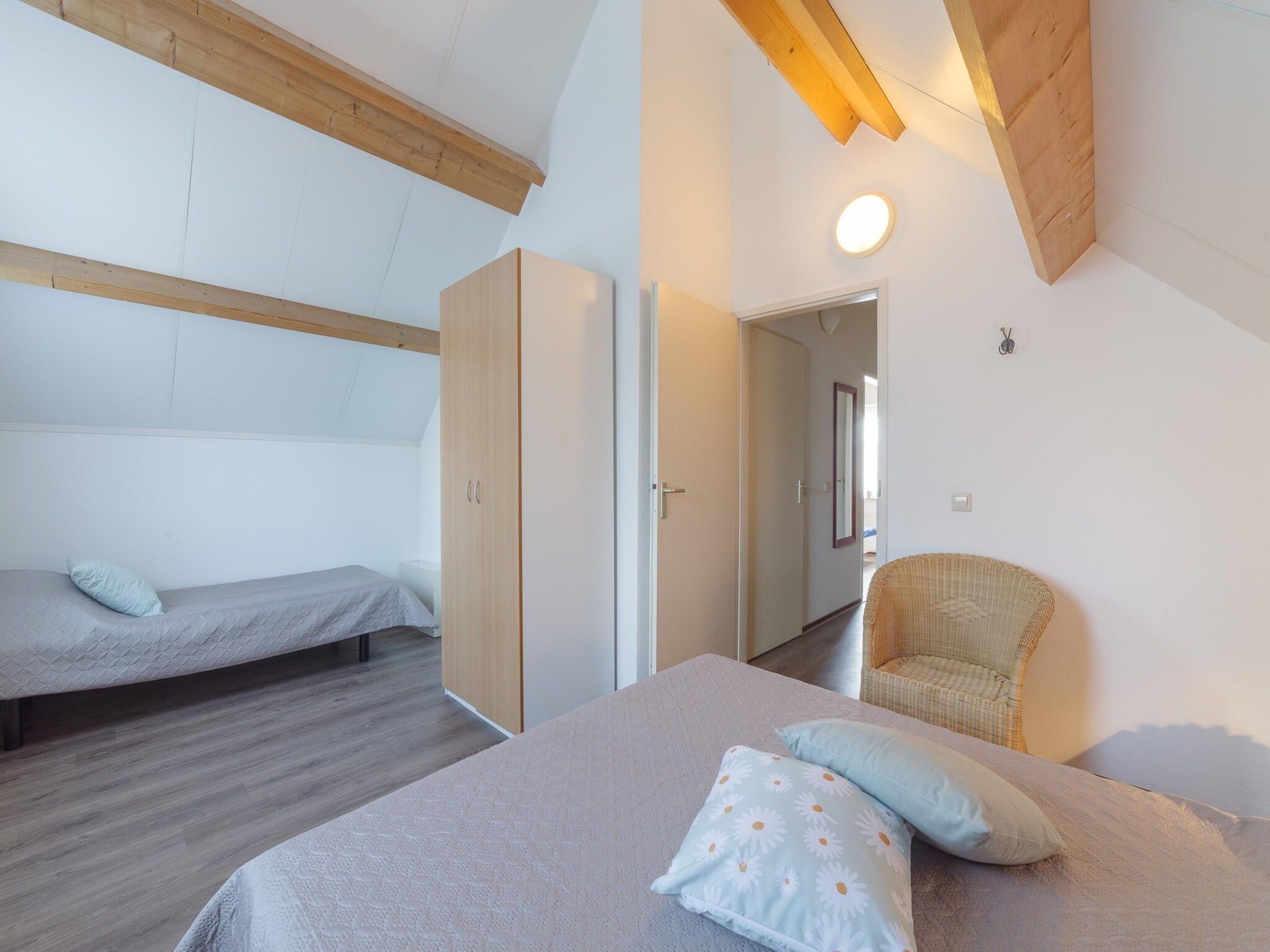 Een slaapkamer van Villapark De Oesterbaai 75 in Wemeldinge