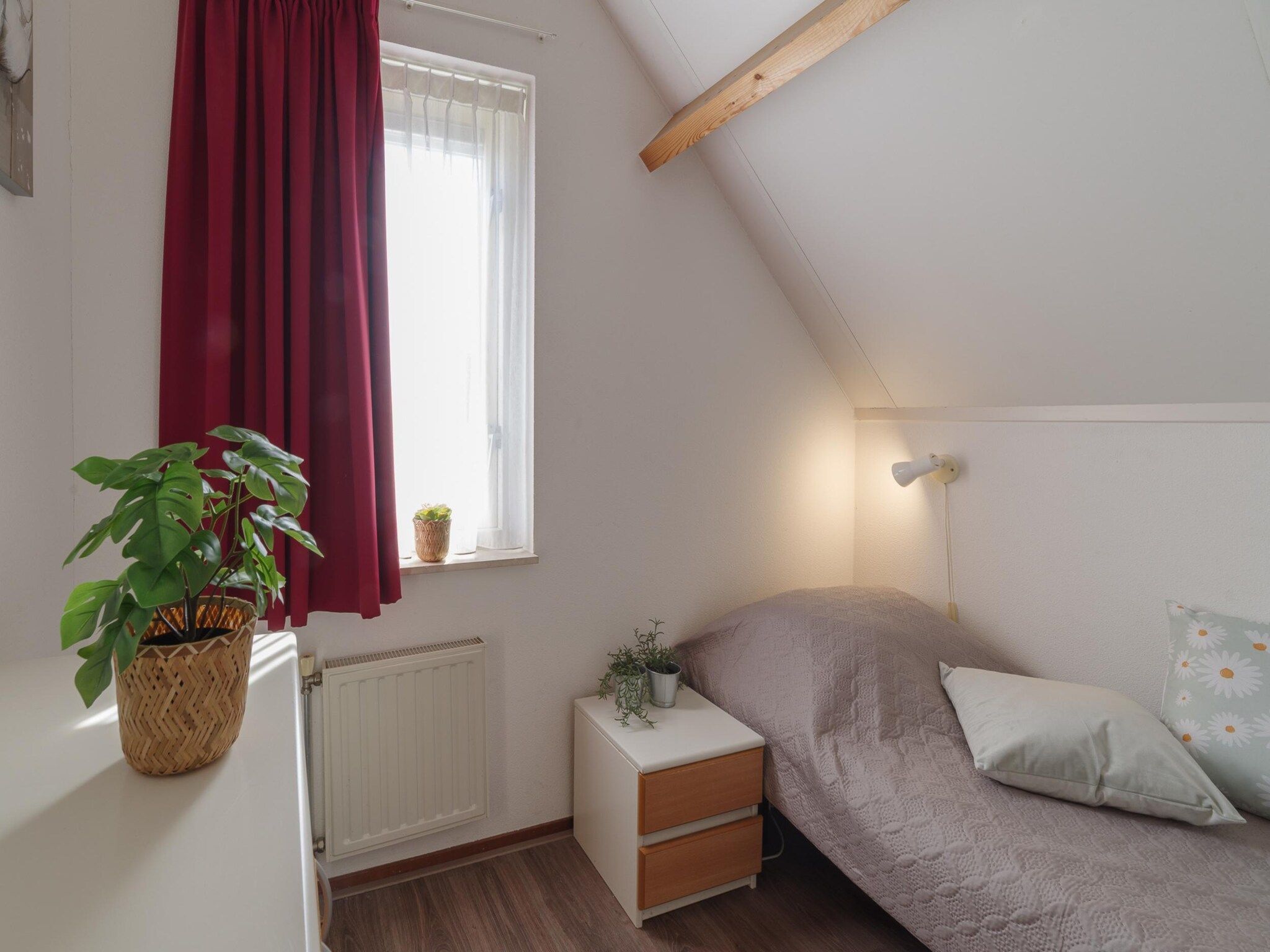 Een slaapkamer van Villapark De Oesterbaai 75 in Wemeldinge