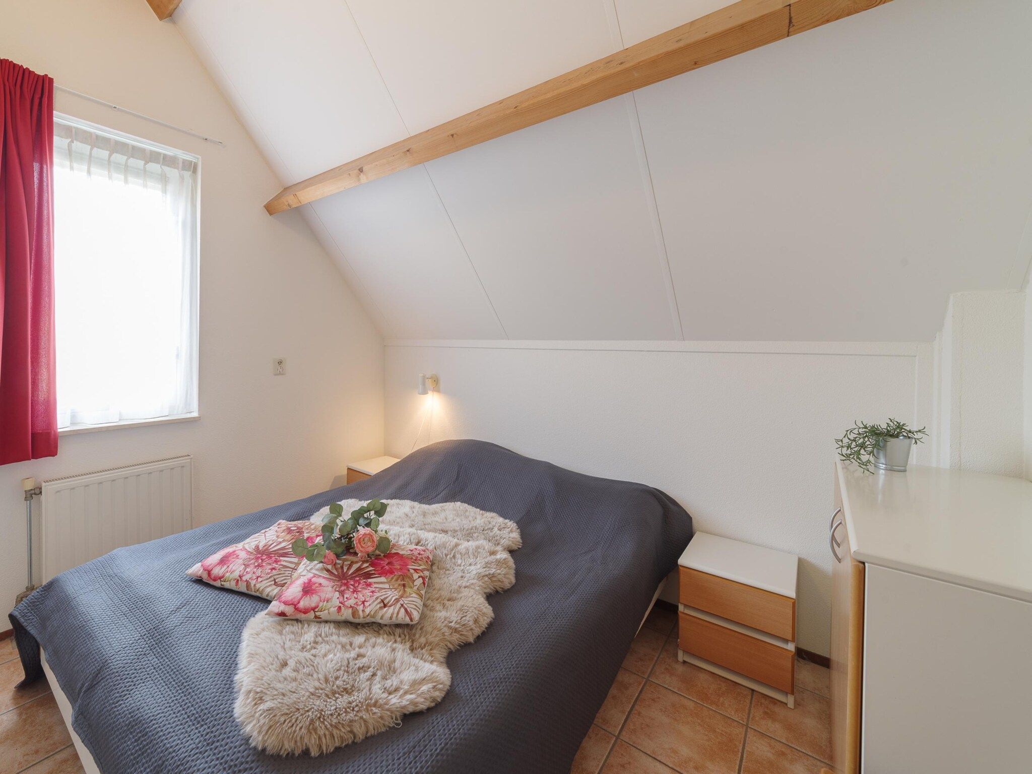 Een slaapkamer van Villapark De Oesterbaai 77 in Wemeldinge