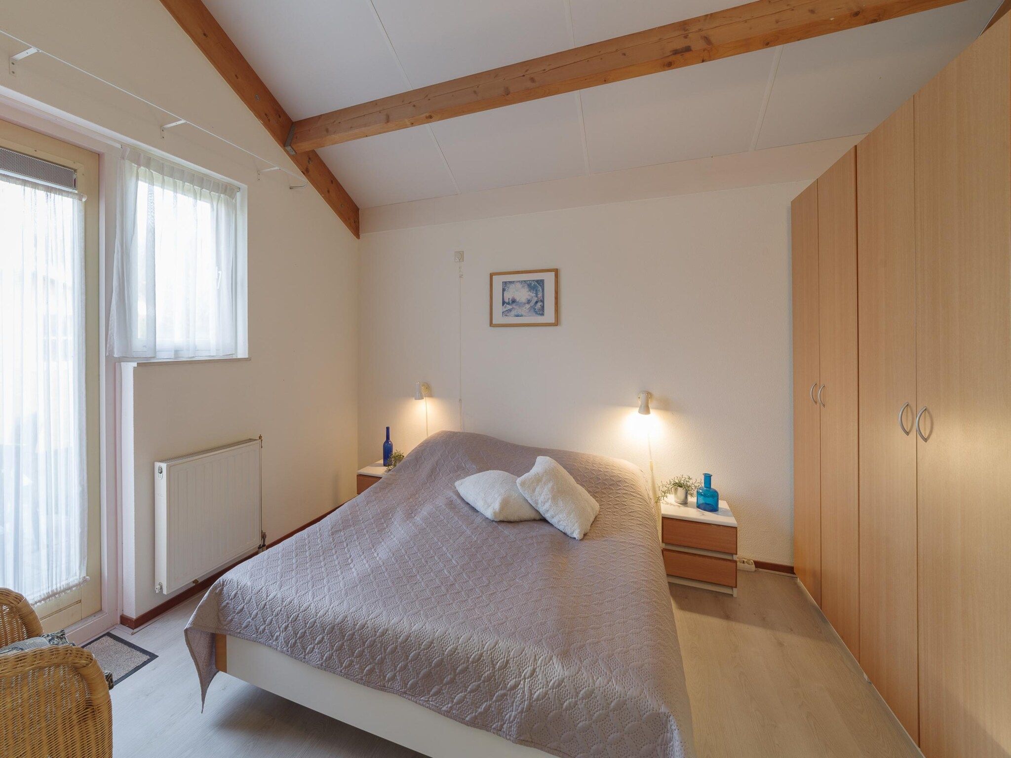 Een slaapkamer van Villapark De Oesterbaai 91 in Wemeldinge