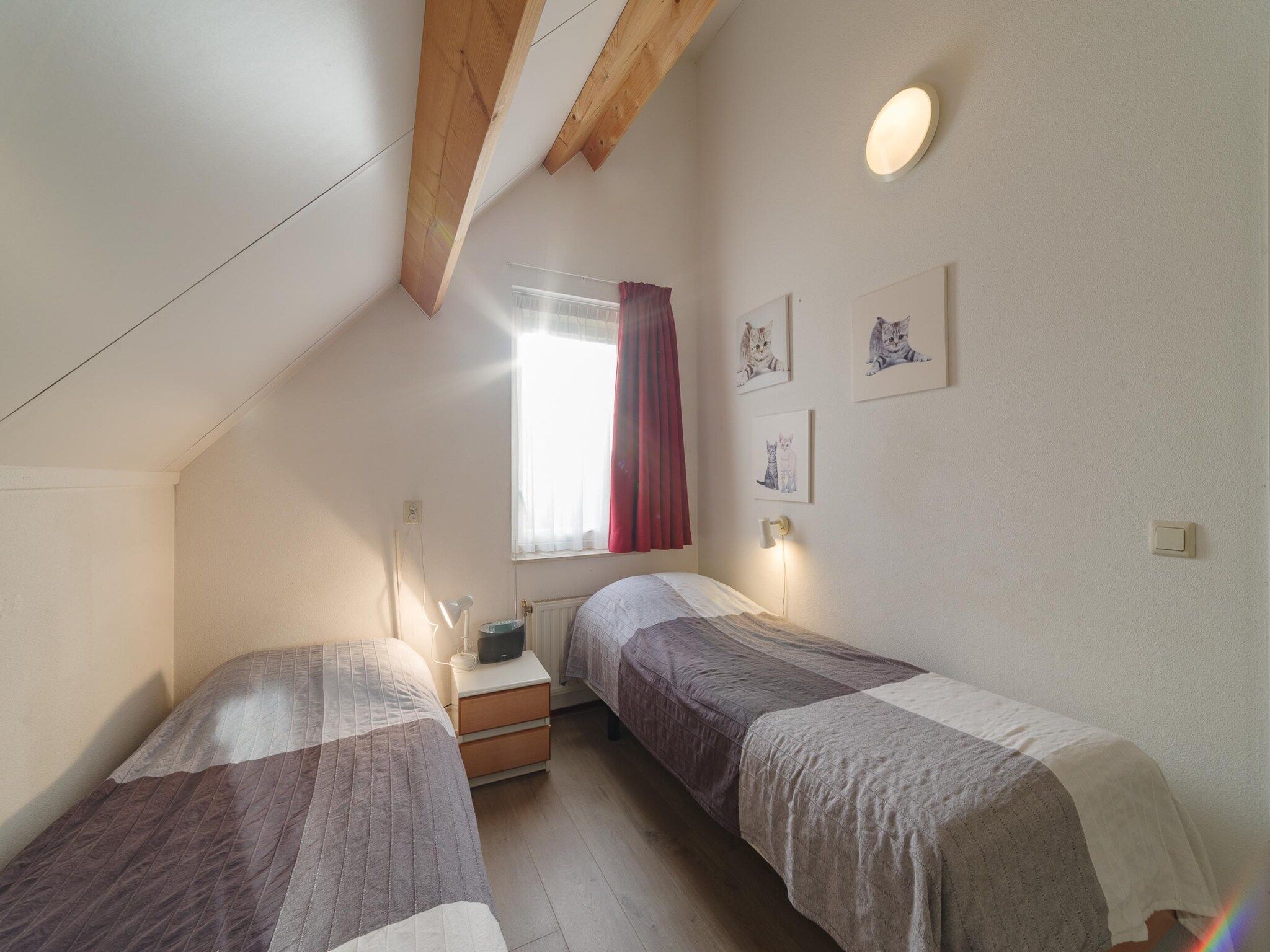 Een slaapkamer van Villapark De Oesterbaai 91 in Wemeldinge