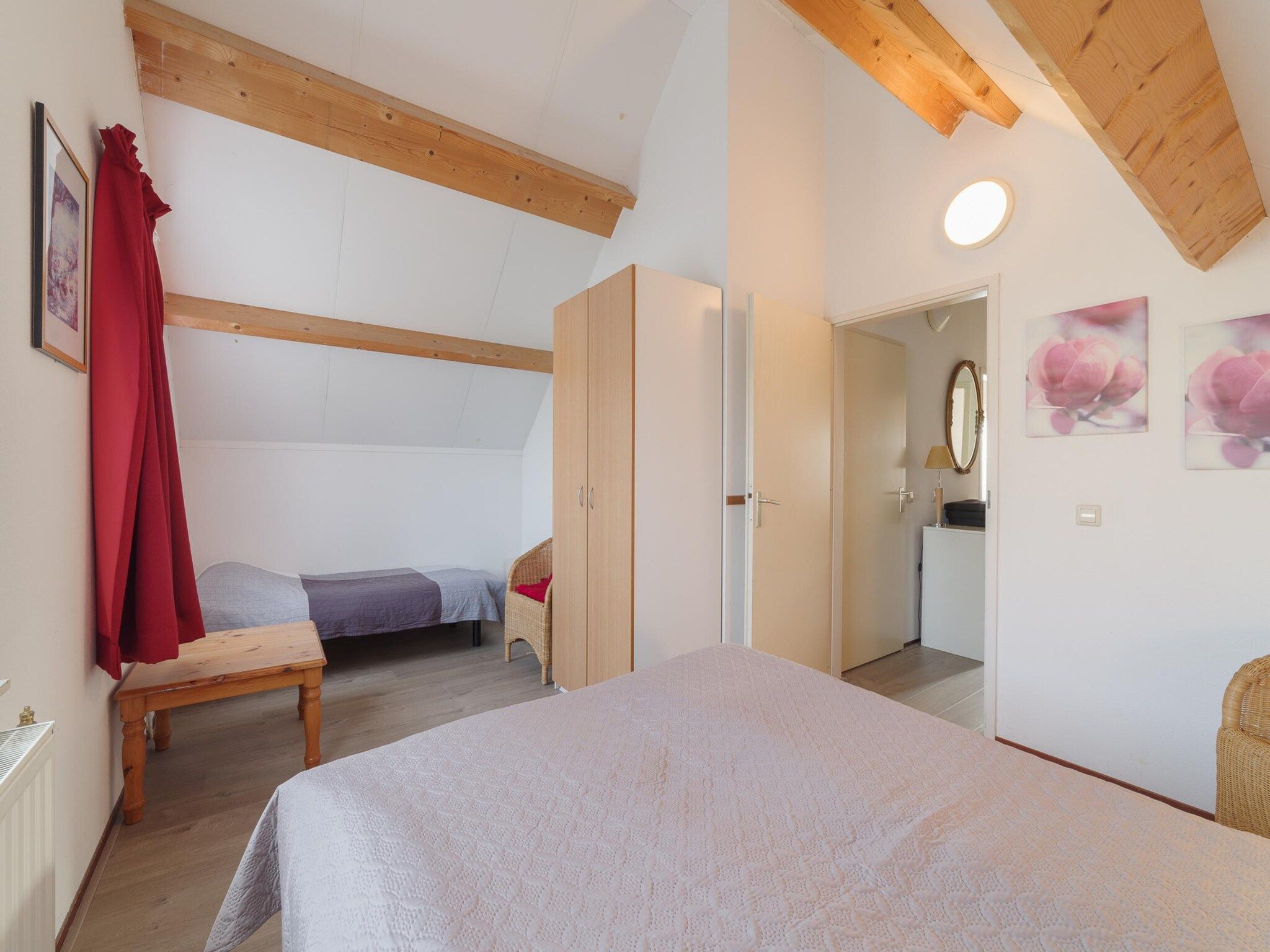 Een slaapkamer van Villapark De Oesterbaai 91 in Wemeldinge