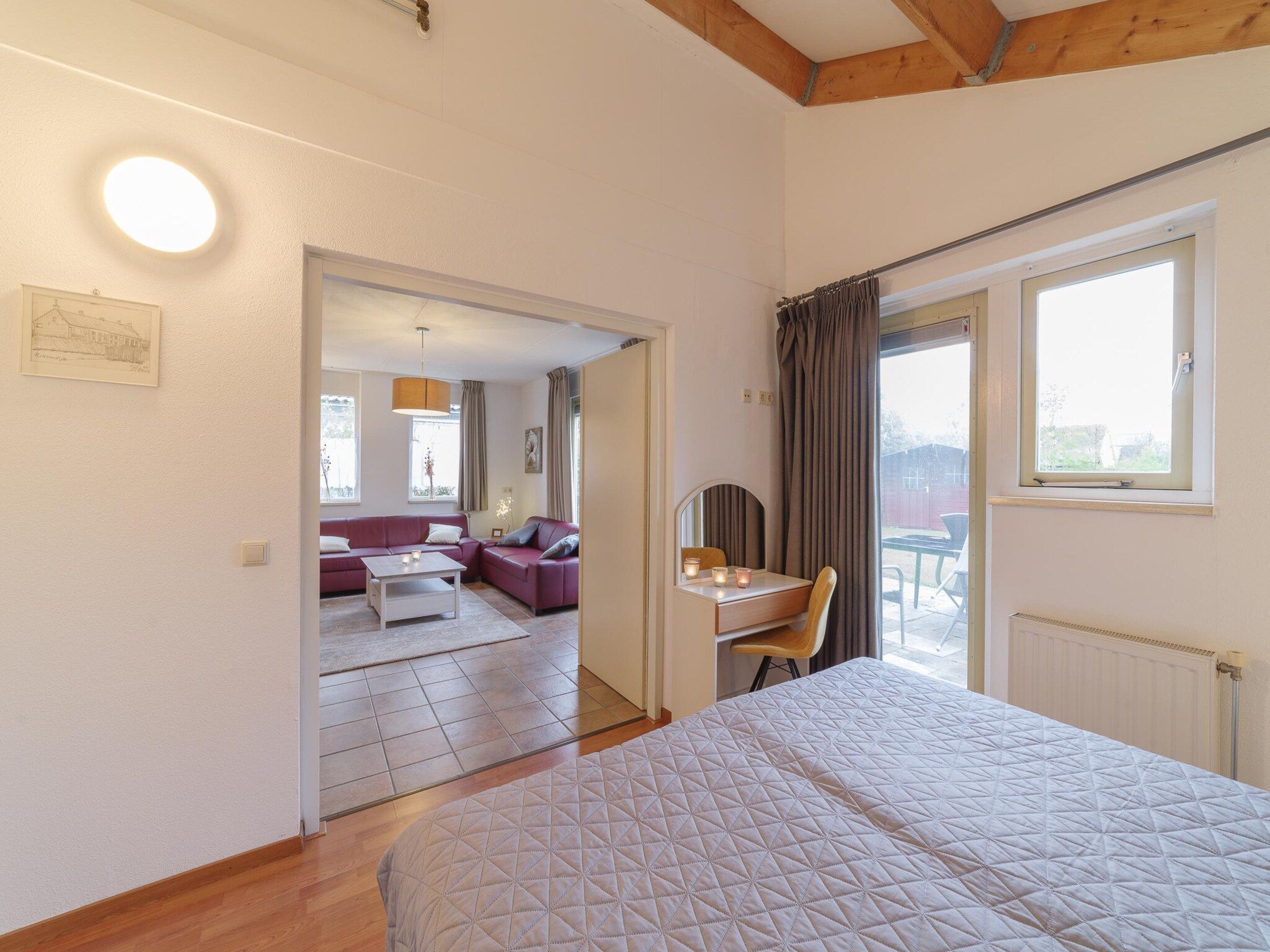 Een slaapkamer van Villapark De Oesterbaai 99 in Wemeldinge