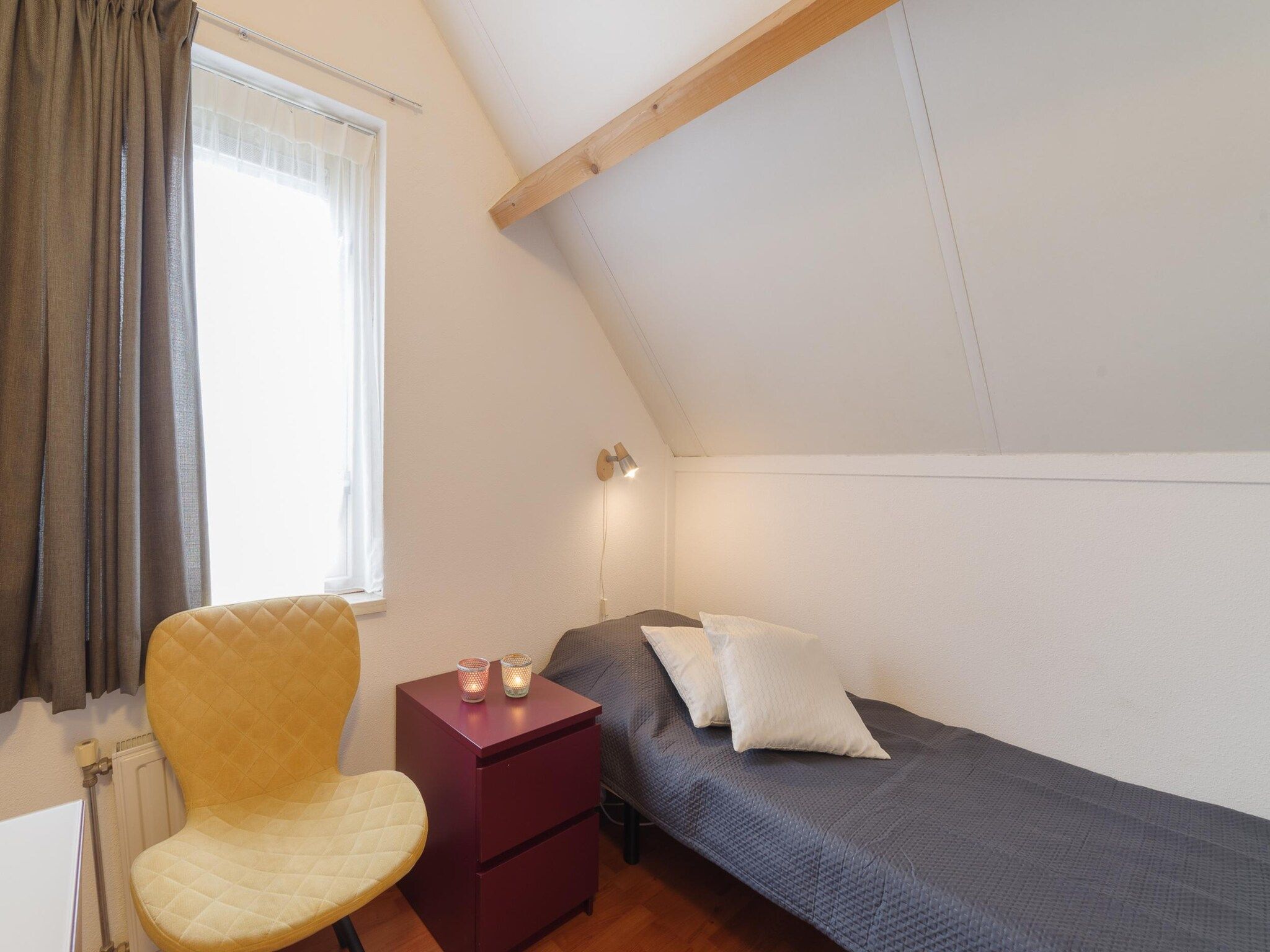 Een slaapkamer van Villapark De Oesterbaai 99 in Wemeldinge