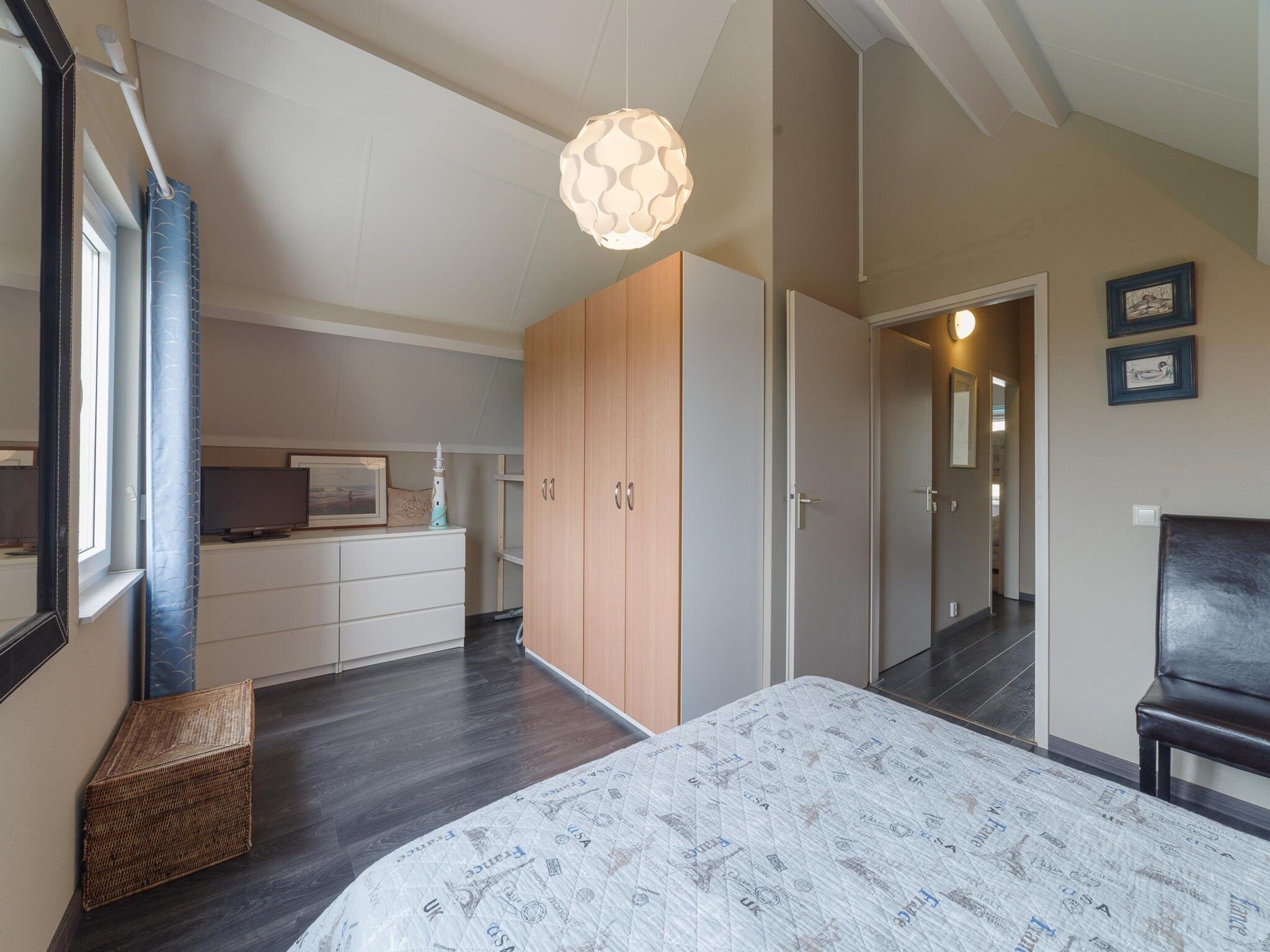 Een slaapkamer van Villapark De Oesterbaai 117 in Wemeldinge