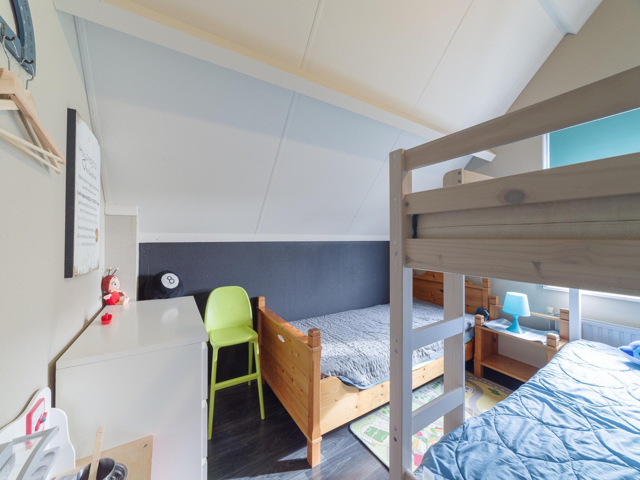 Een slaapkamer van Villapark De Oesterbaai 117 in Wemeldinge