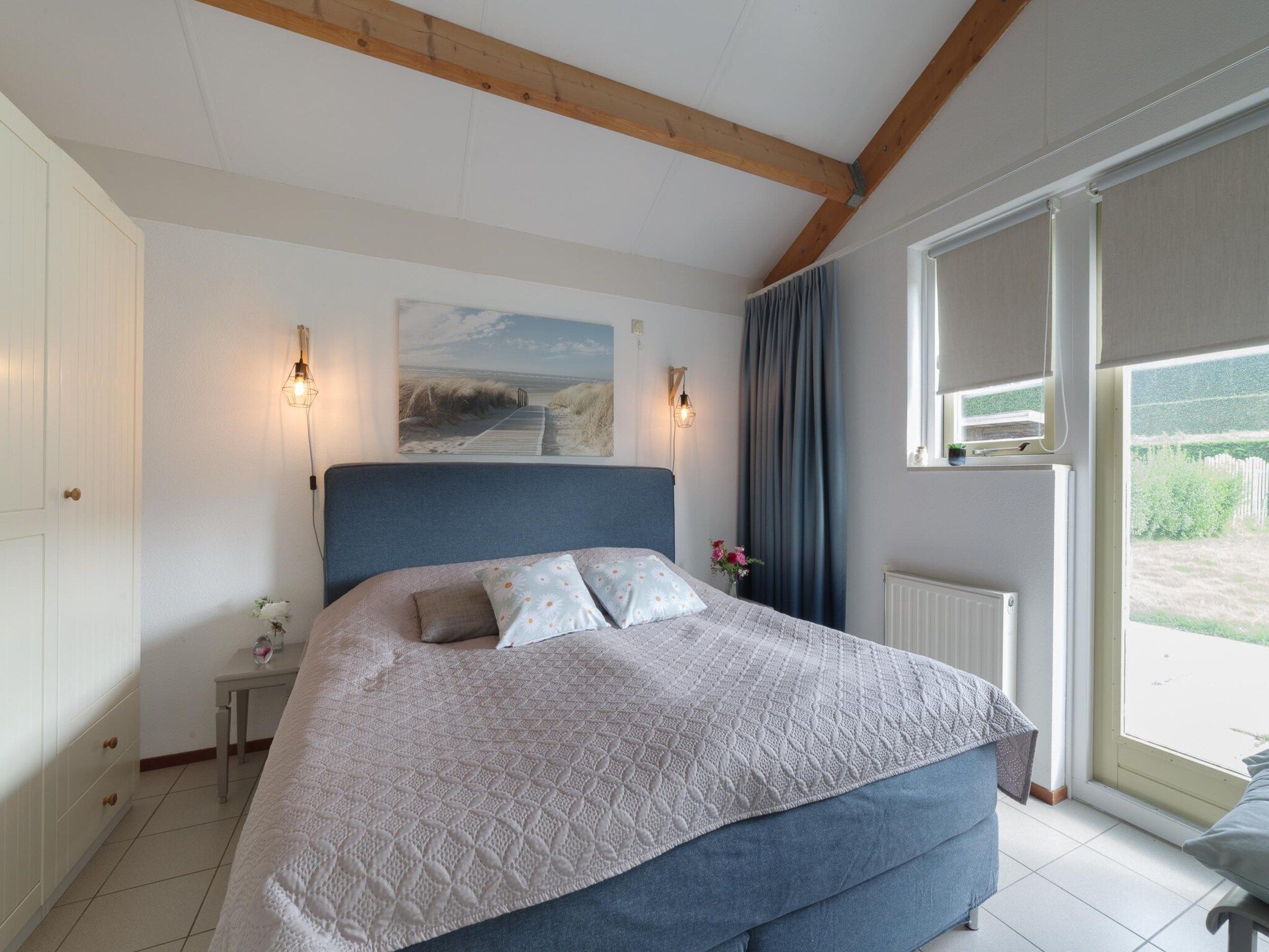 Een slaapkamer van Villapark De Oesterbaai 123 in Wemeldinge