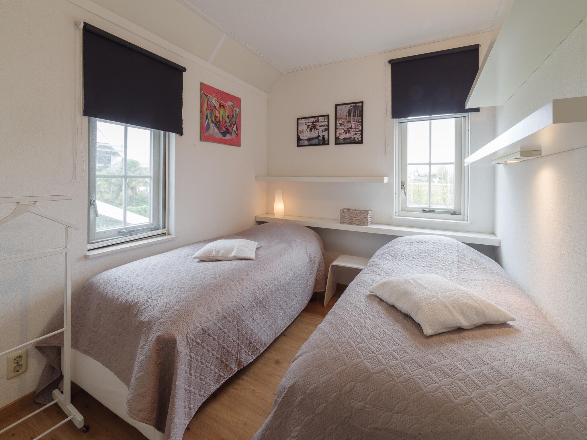 Een slaapkamer van Villapark De Oesterbaai 136 in Wemeldinge