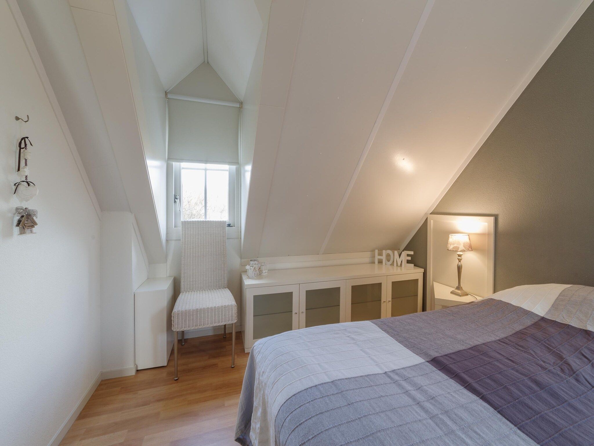 Een slaapkamer van Villapark De Oesterbaai 142 in Wemeldinge