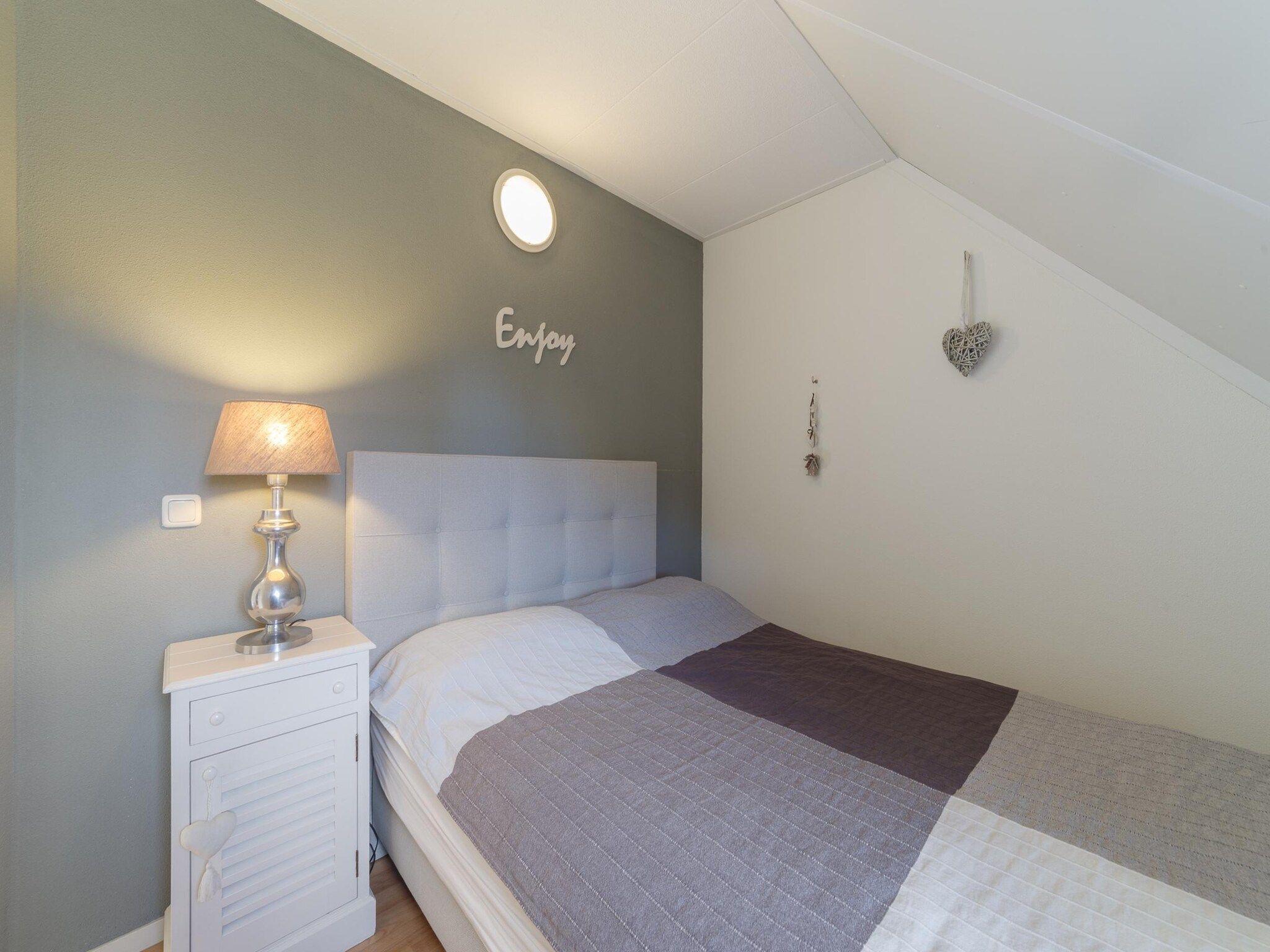 Een slaapkamer van Villapark De Oesterbaai 142 in Wemeldinge