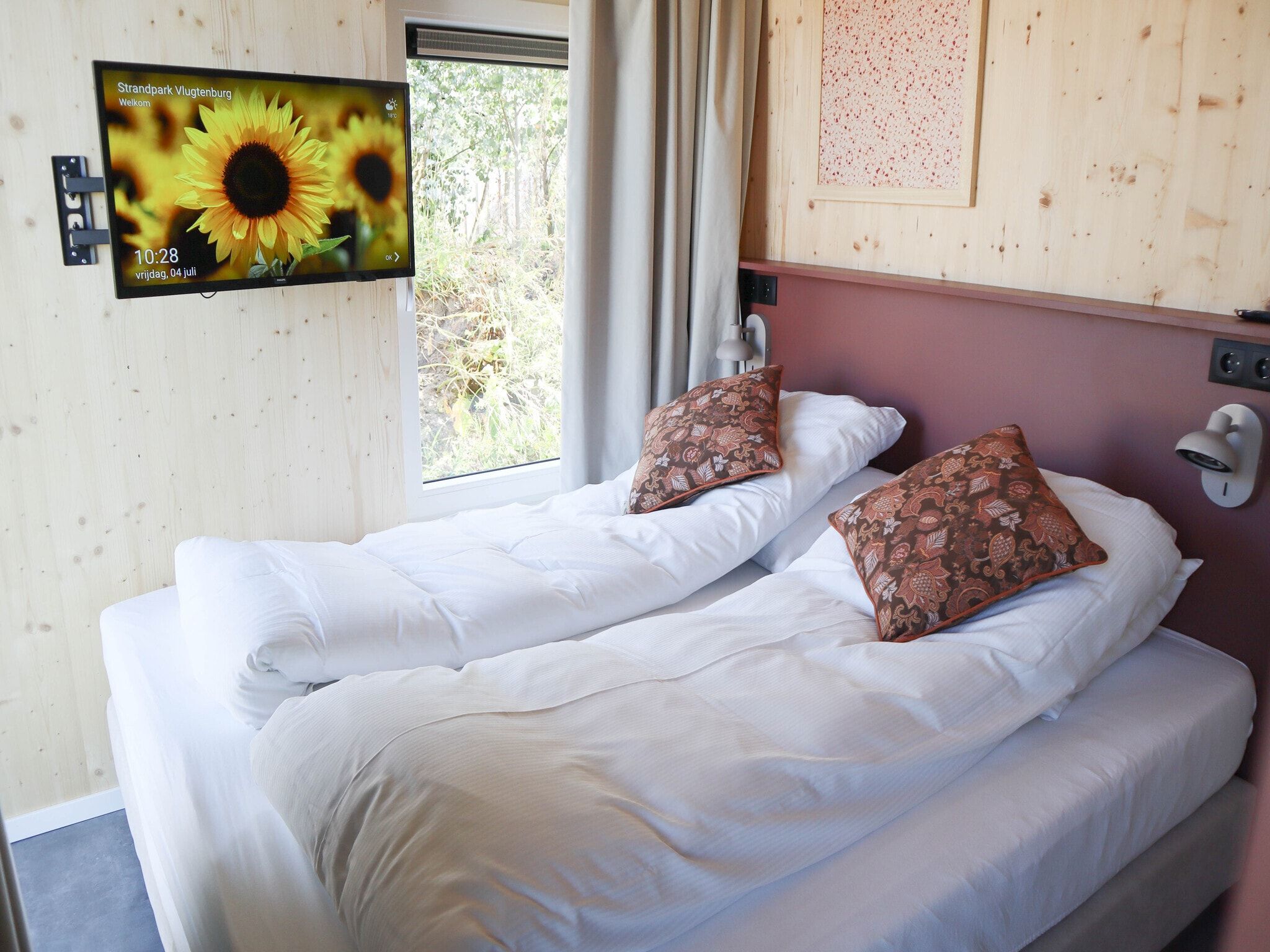 Een slaapkamer van Strandpark Vlugtenburg 15 in s Gravenzande