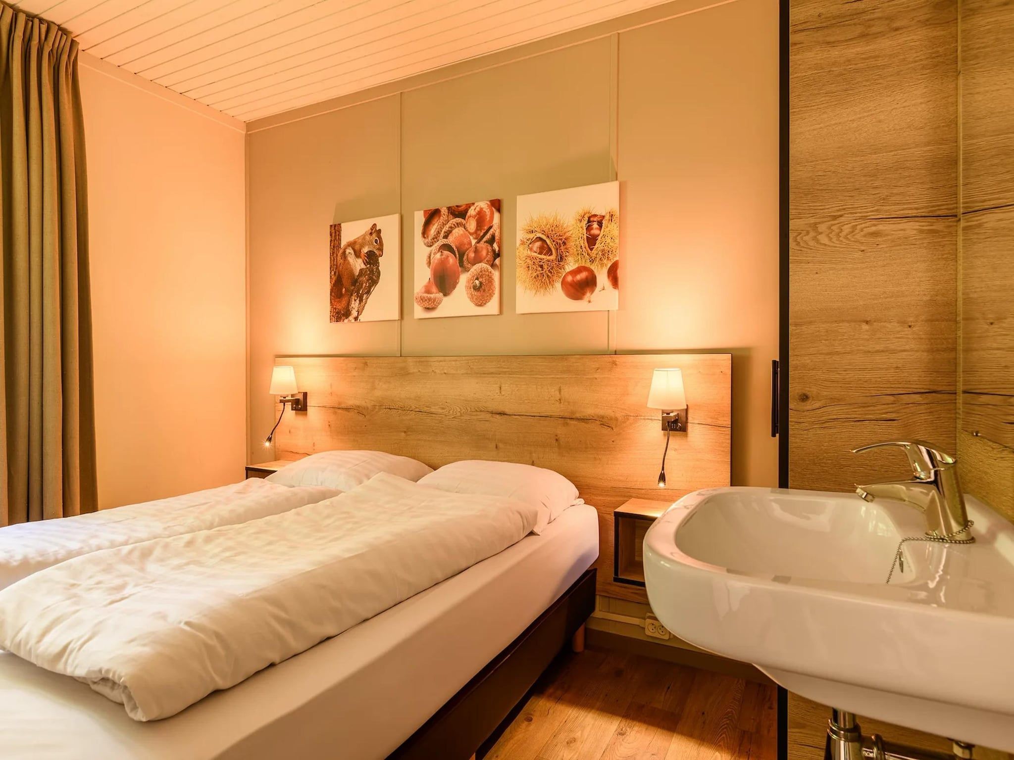 Een slaapkamer van Bungalow 6B1 in Putten