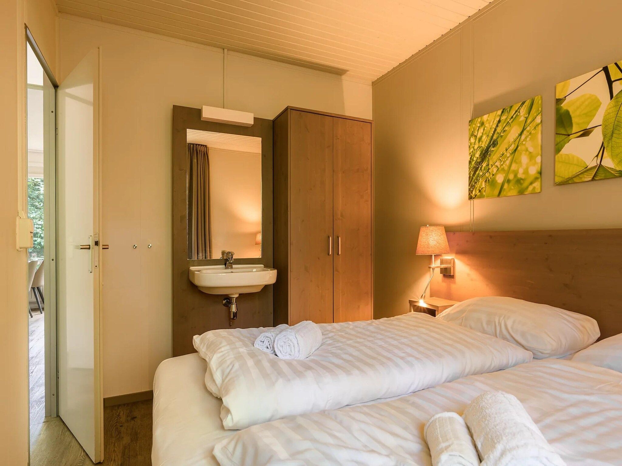 Een slaapkamer van Bungalow 4C3 in Putten