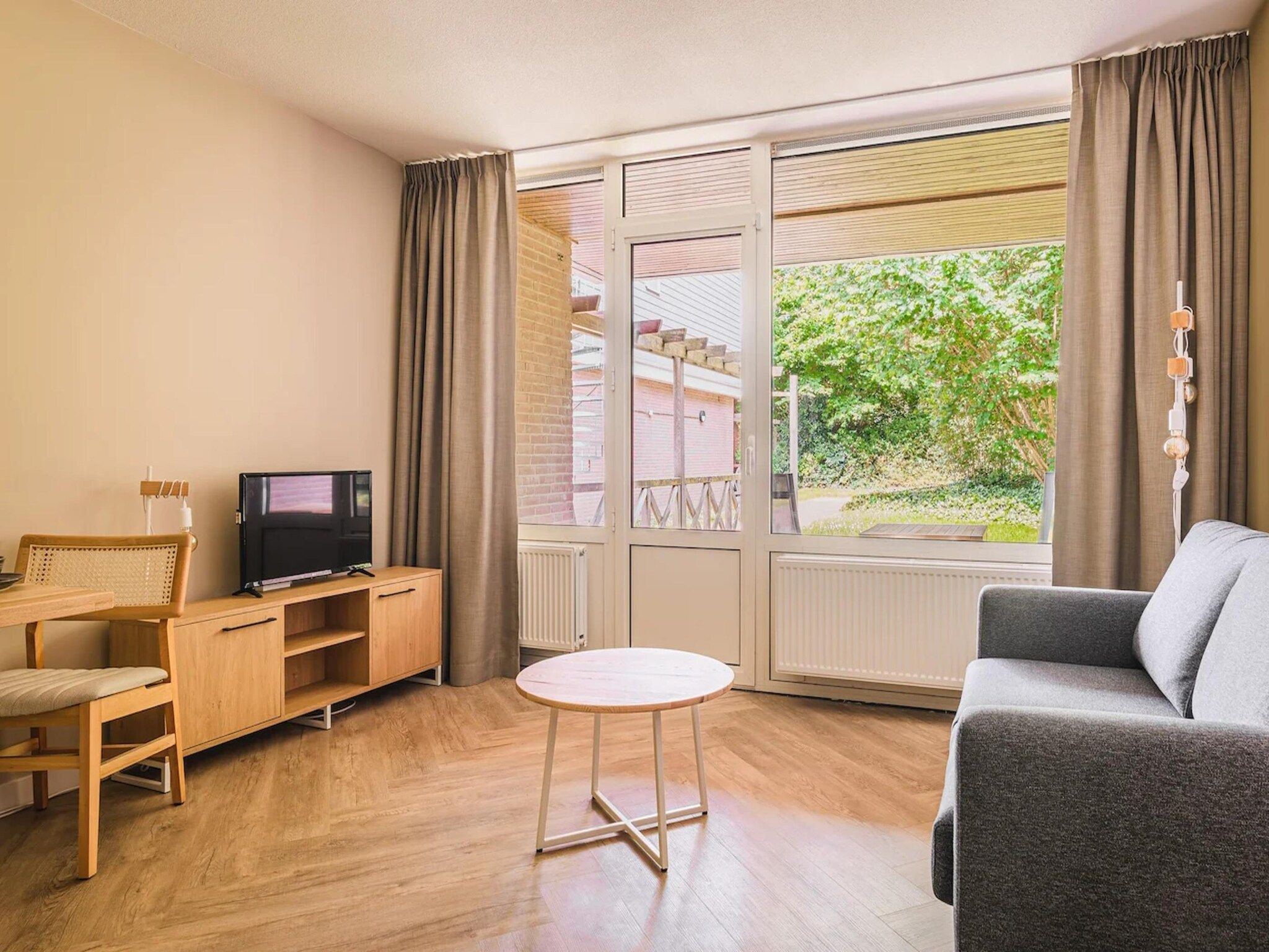 De woonkamer van Appartement Comfort 2AR in Bruinisse