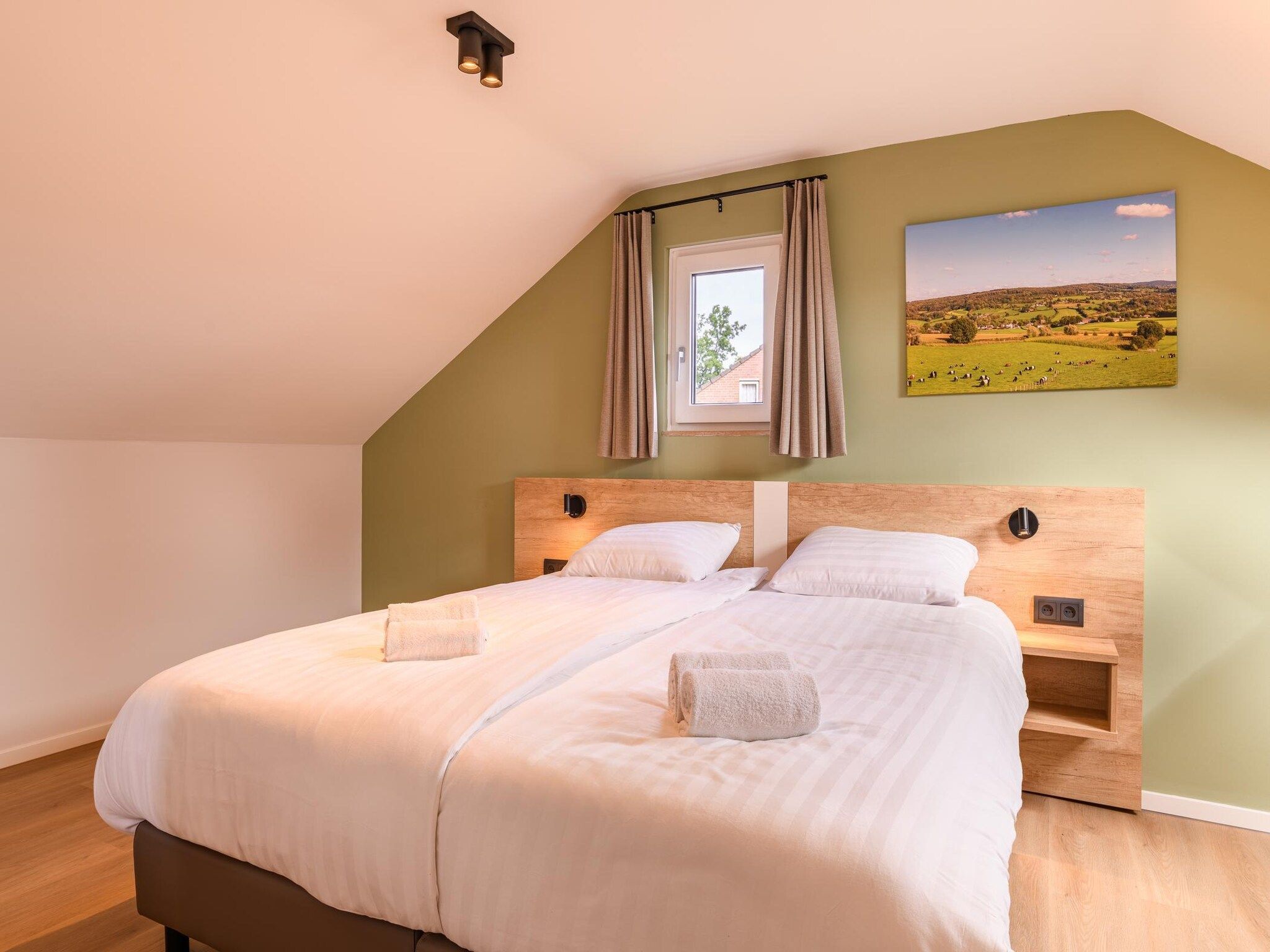 Een slaapkamer van Bungalow 4B1 in Vijlen