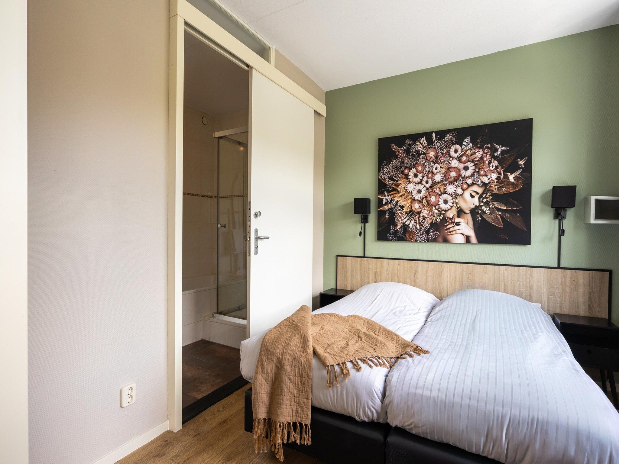 Een slaapkamer van Andijk 15 in Andijk