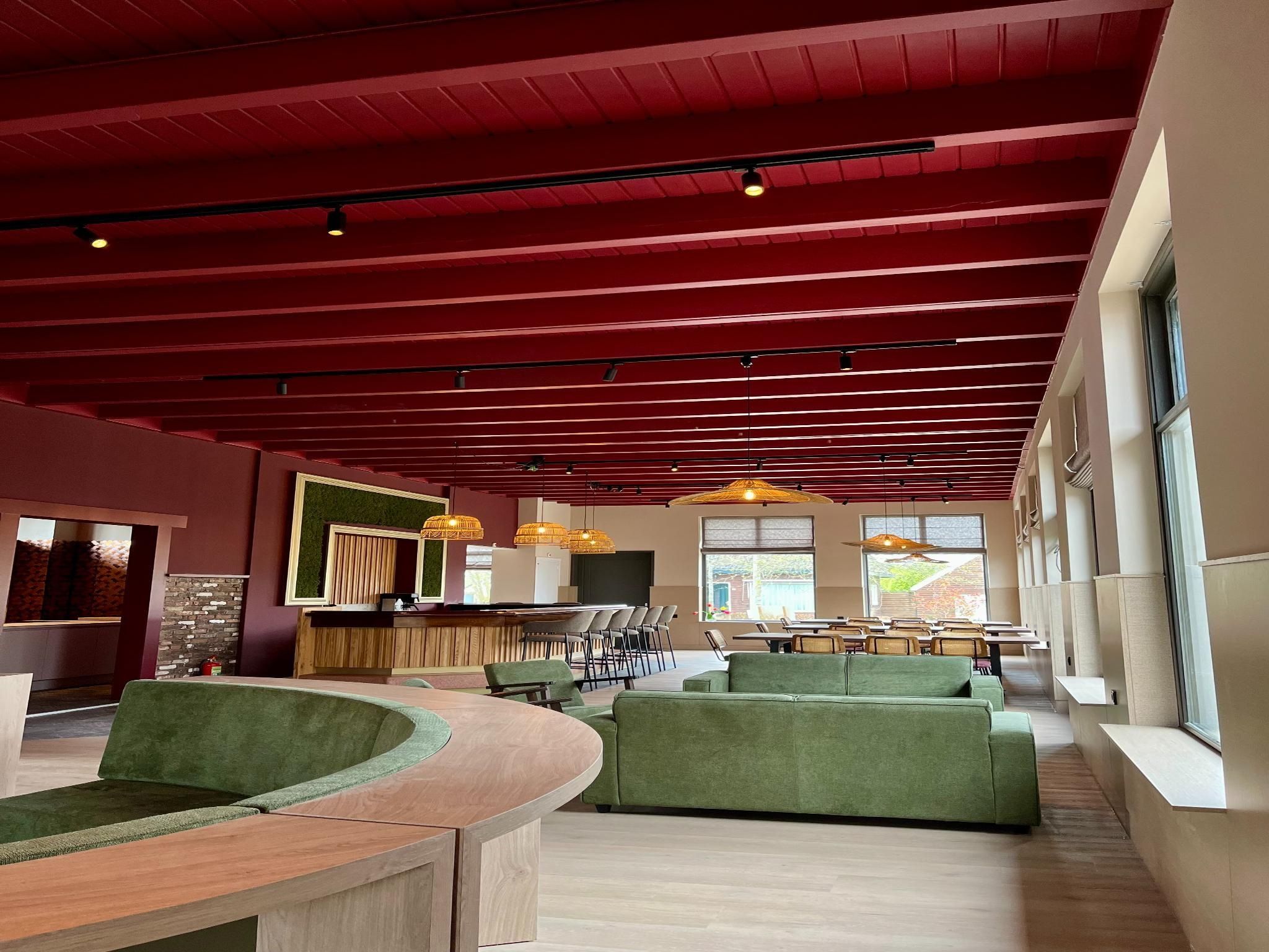 De woonkamer van Groepsaccommodatie voor 20 personen + 5 Tiny Greenhouses voor 2 tot 4 personen in Scherpenzeel (FR)