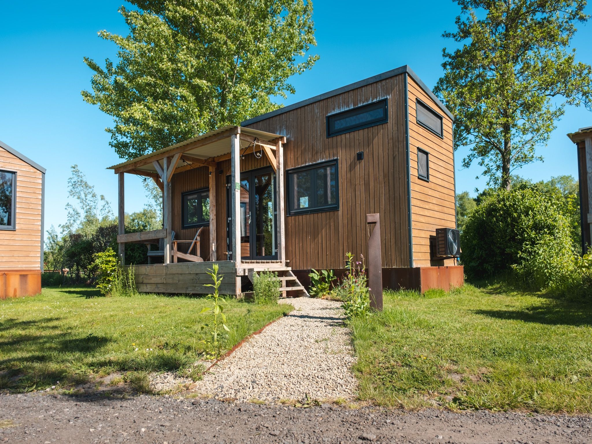 De buitenkant van Groepsaccommodatie voor 20 personen + 5 Tiny Greenhouses voor 2 tot 4 personen in Scherpenzeel (FR)