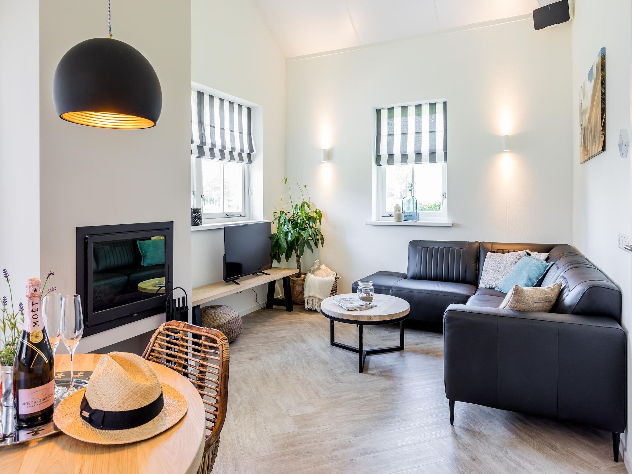 De woonkamer van Bungalowpark de Gouden Spar 6 in Noordwijk