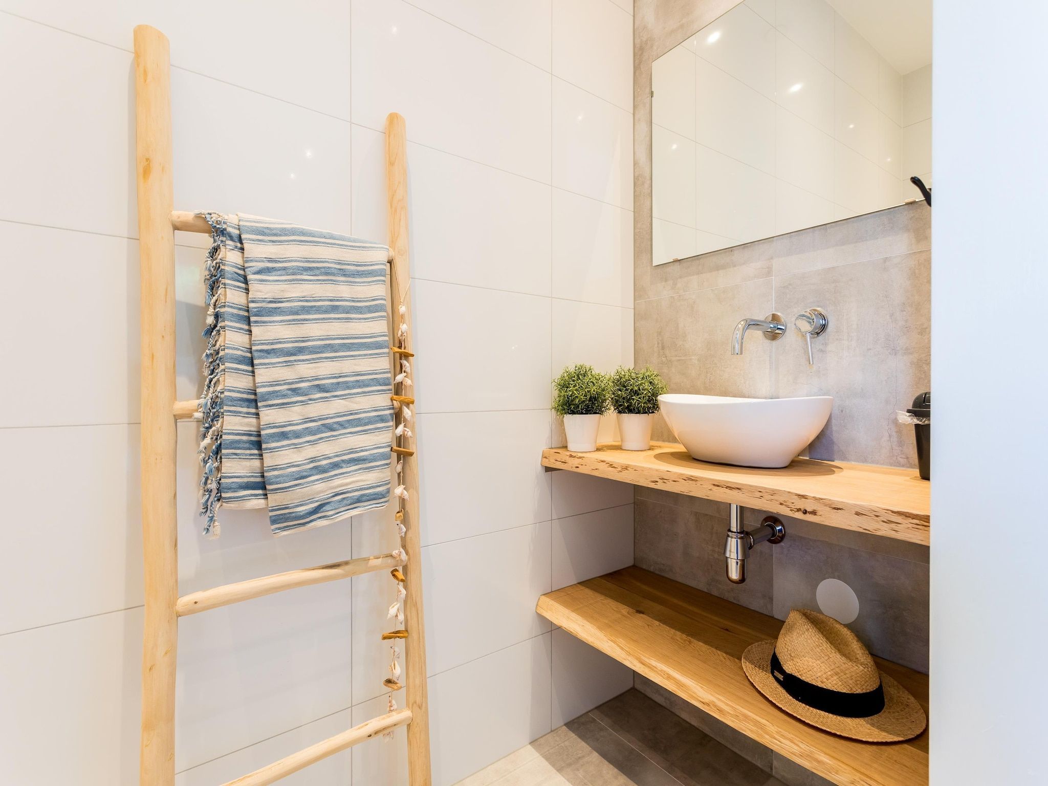 De badkamer van Bungalowpark de Gouden Spar 6 in Noordwijk