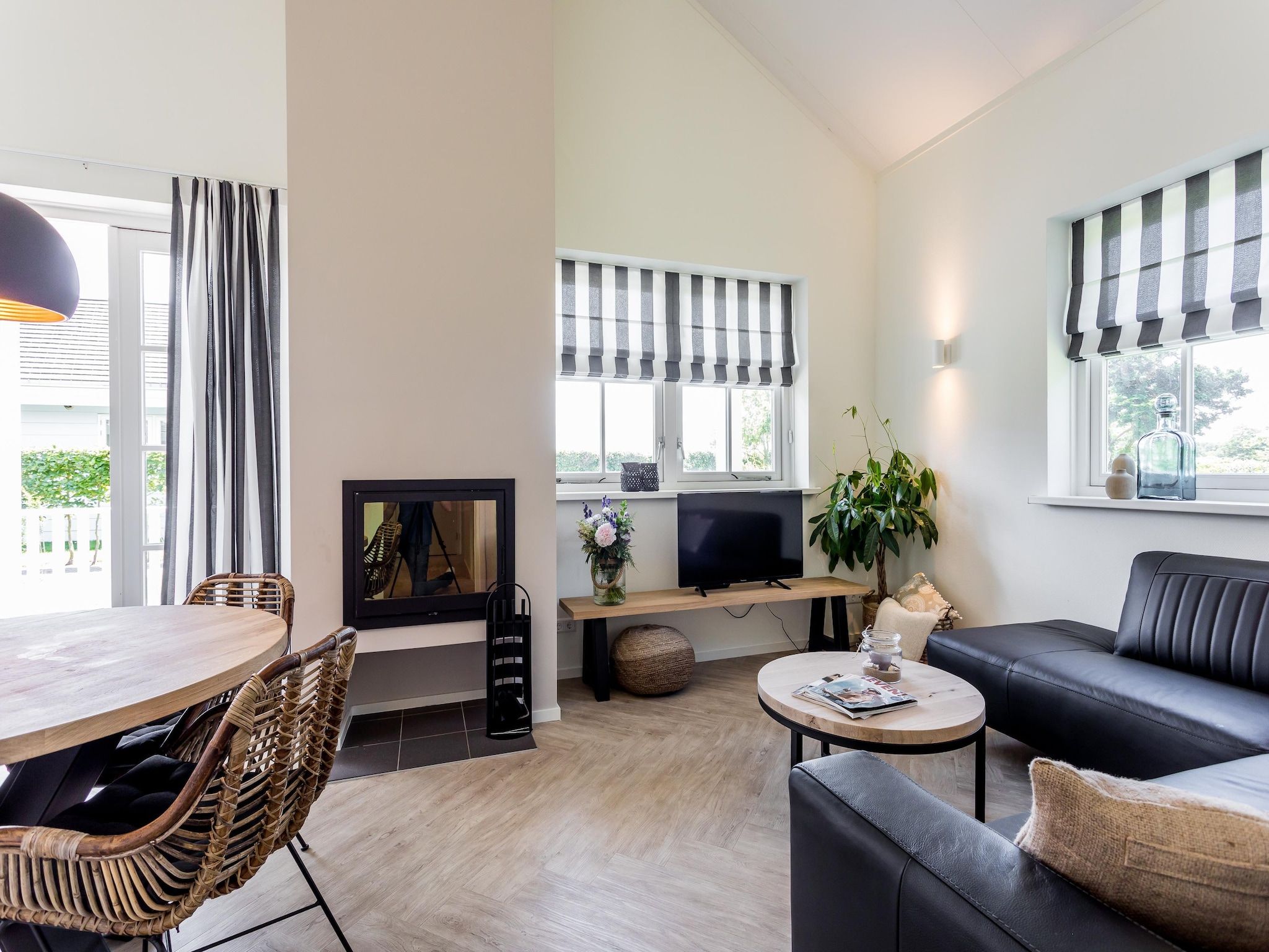 De woonkamer van Bungalowpark de Gouden Spar 6 in Noordwijk